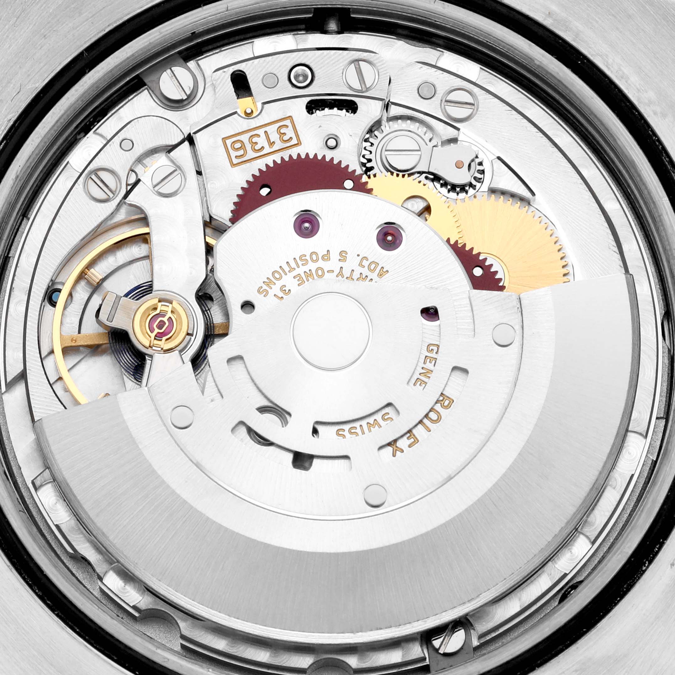 This image shows a close-up of the movement mechanism inside a Rolex Datejust 41 116334 Men
s Stainless Steel Grey Dial 116334 Men
s Stainless Steel Grey Dial watch.