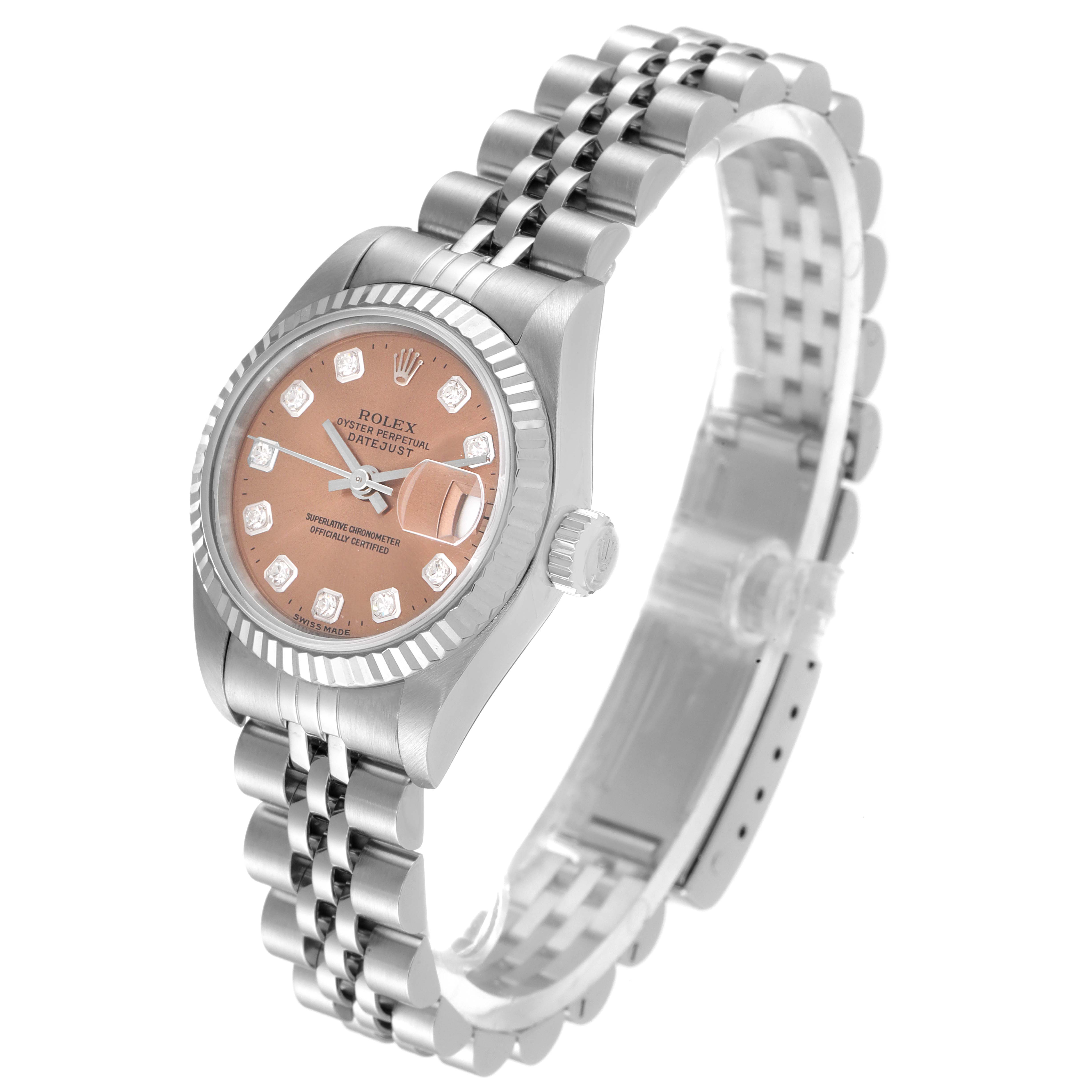 This image shows a slight side angle of a Rolex Datejust 69174 Women's Stainless Steel Pink Dial 69174 Women's Stainless Steel Pink Dial watch, highlighting its face, bezel, crown, and bracelet.