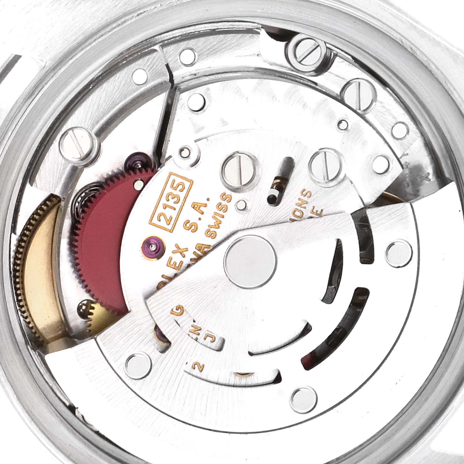 The image shows a close-up of the movement mechanism of a Rolex Datejust 69174 Women's Stainless Steel Pink Dial 69174 Women's Stainless Steel Pink Dial watch, highlighting inner gears and components.
