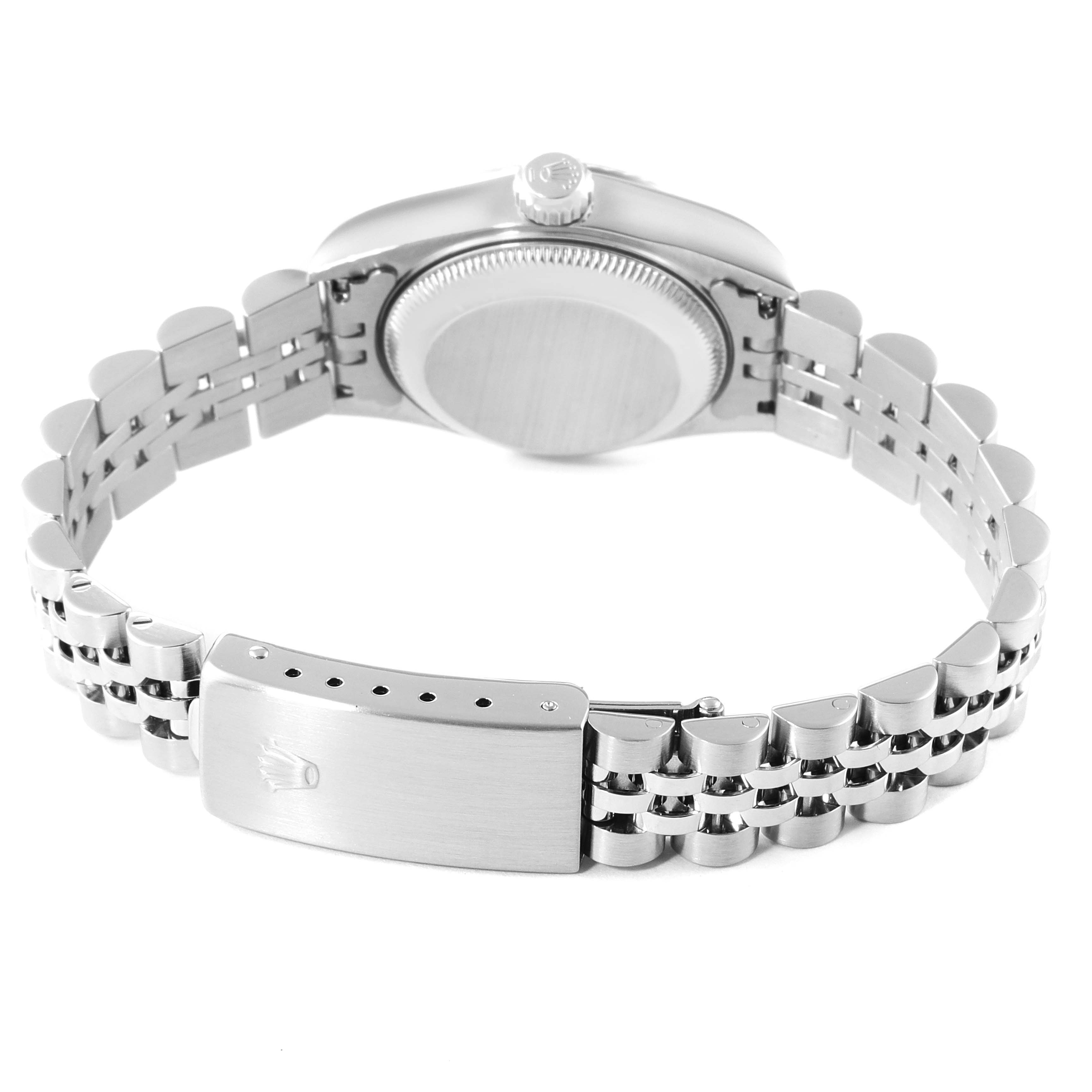 This image shows the back view of a Rolex Datejust 69174 Women's Stainless Steel Pink Dial 69174 Women's Stainless Steel Pink Dial watch, highlighting the case back, crown, and bracelet clasp.