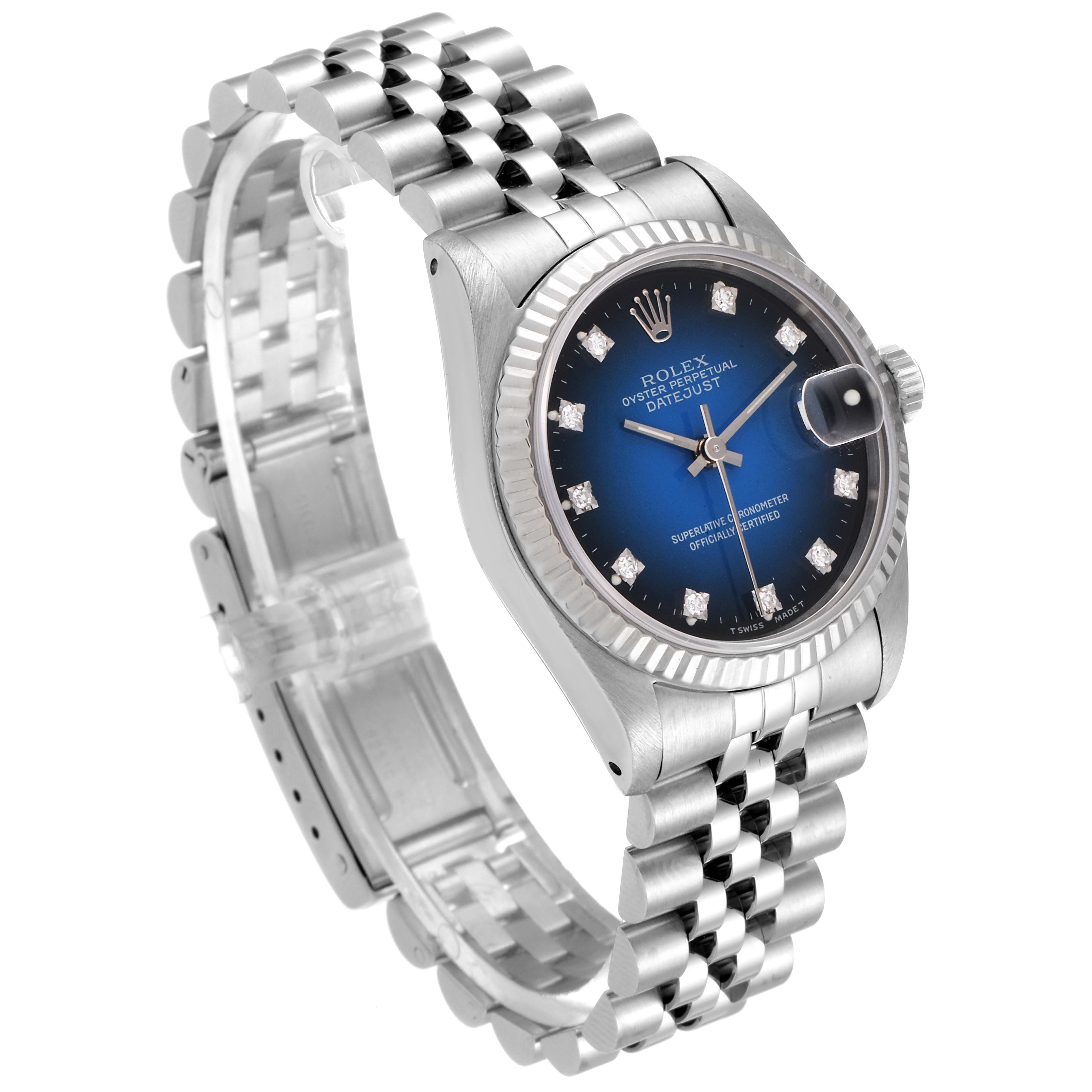 The image shows a Rolex Mid-Size 68274 Women's Stainless Steel Blue Dial 68274 Women's Stainless Steel Blue Dial Datejust watch at a slight angle, detailing the bracelet, bezel, dial, and crown.