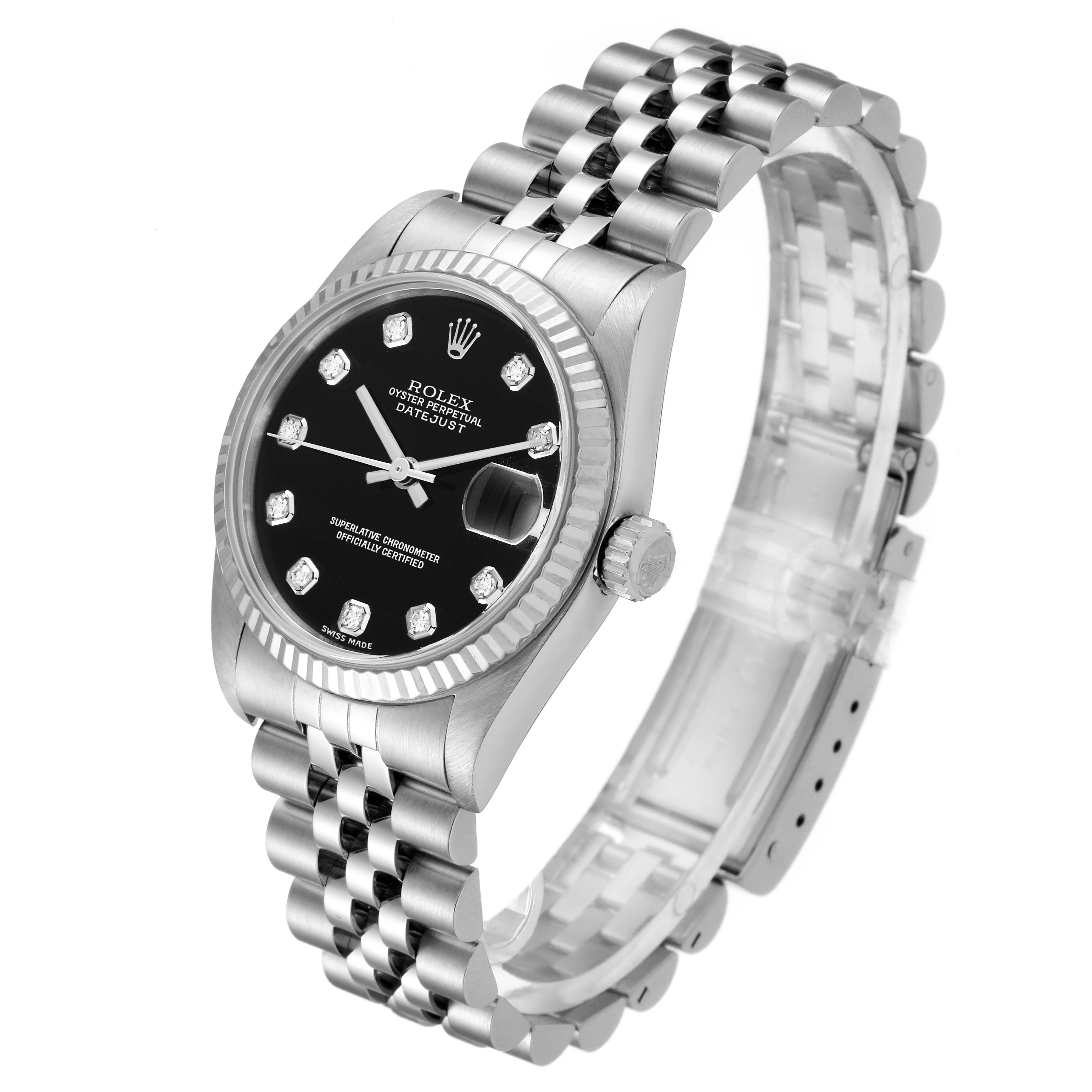 This image shows a Rolex Datejust 78274 Women's Stainless Steel Black Dial 78274 Women's Stainless Steel Black Dial watch from a three-quarter angle revealing the dial, bezel, crown, and bracelet.