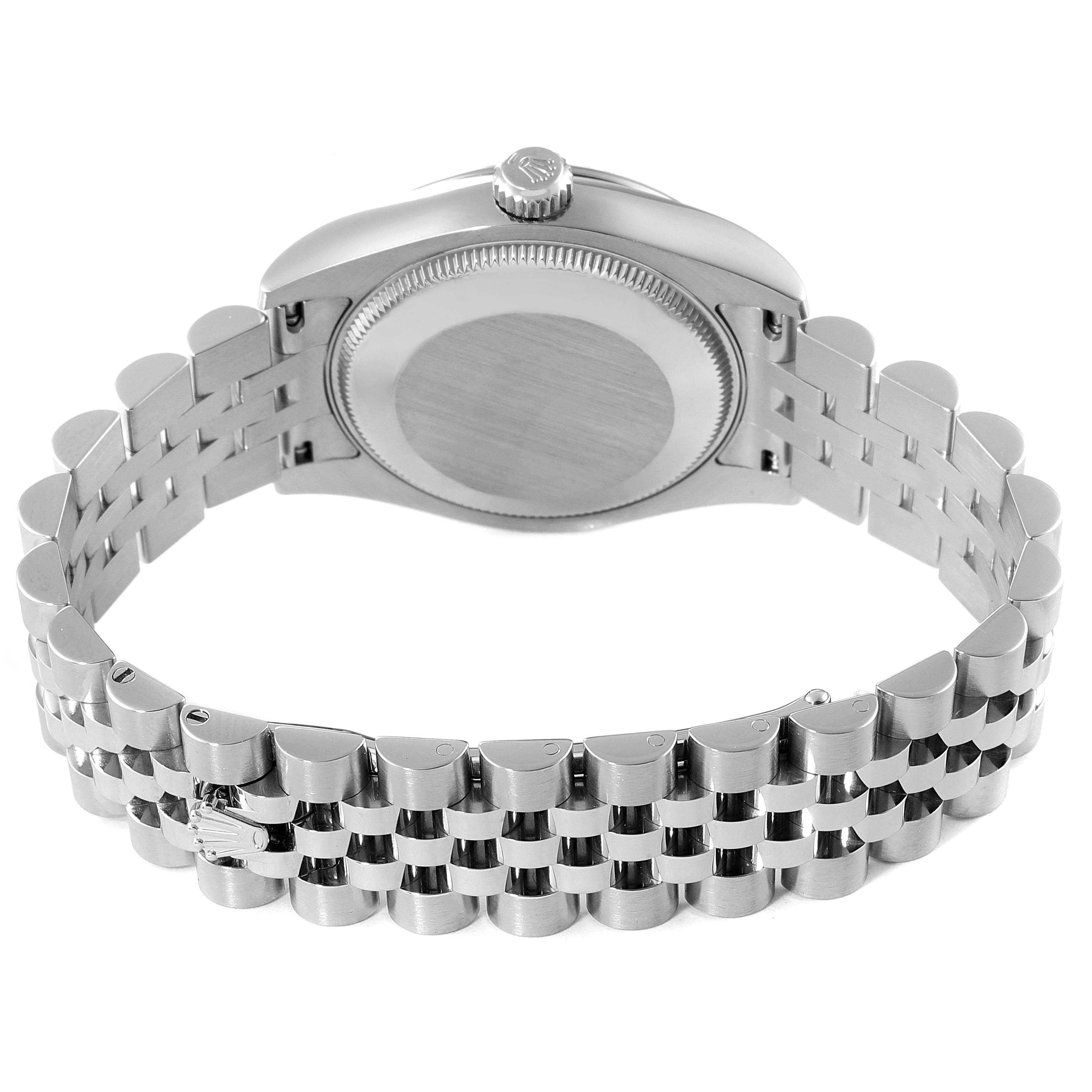 This Mid-Size Rolex watch is shown from the back, highlighting the case back and metal bracelet.