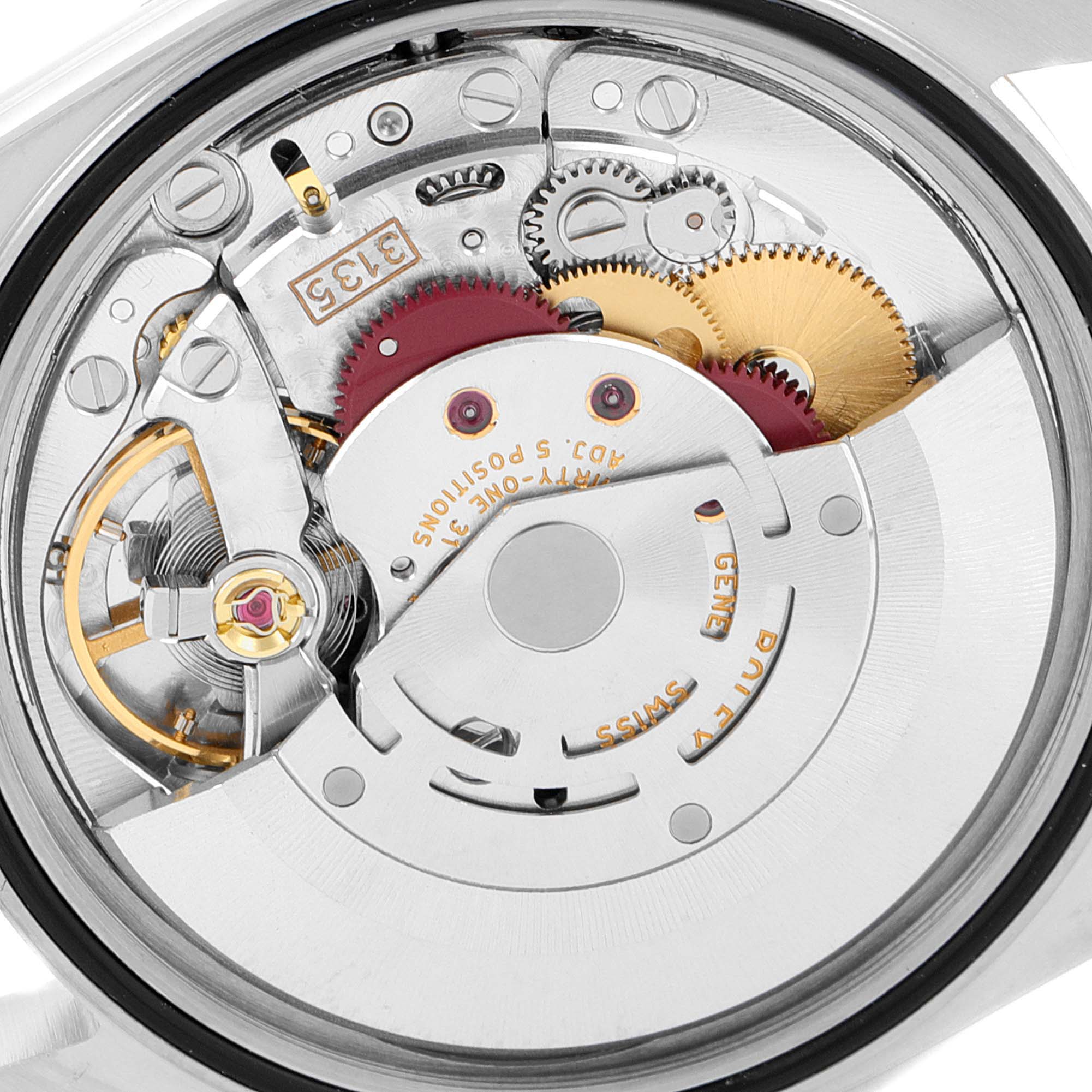 This image shows the intricate gear and rotor mechanism inside a Rolex Datejust 16233 Men's Steel and Gold (two tone) Champagne Dial 16233 Men's Steel and Gold (two tone) Champagne Dial watch.