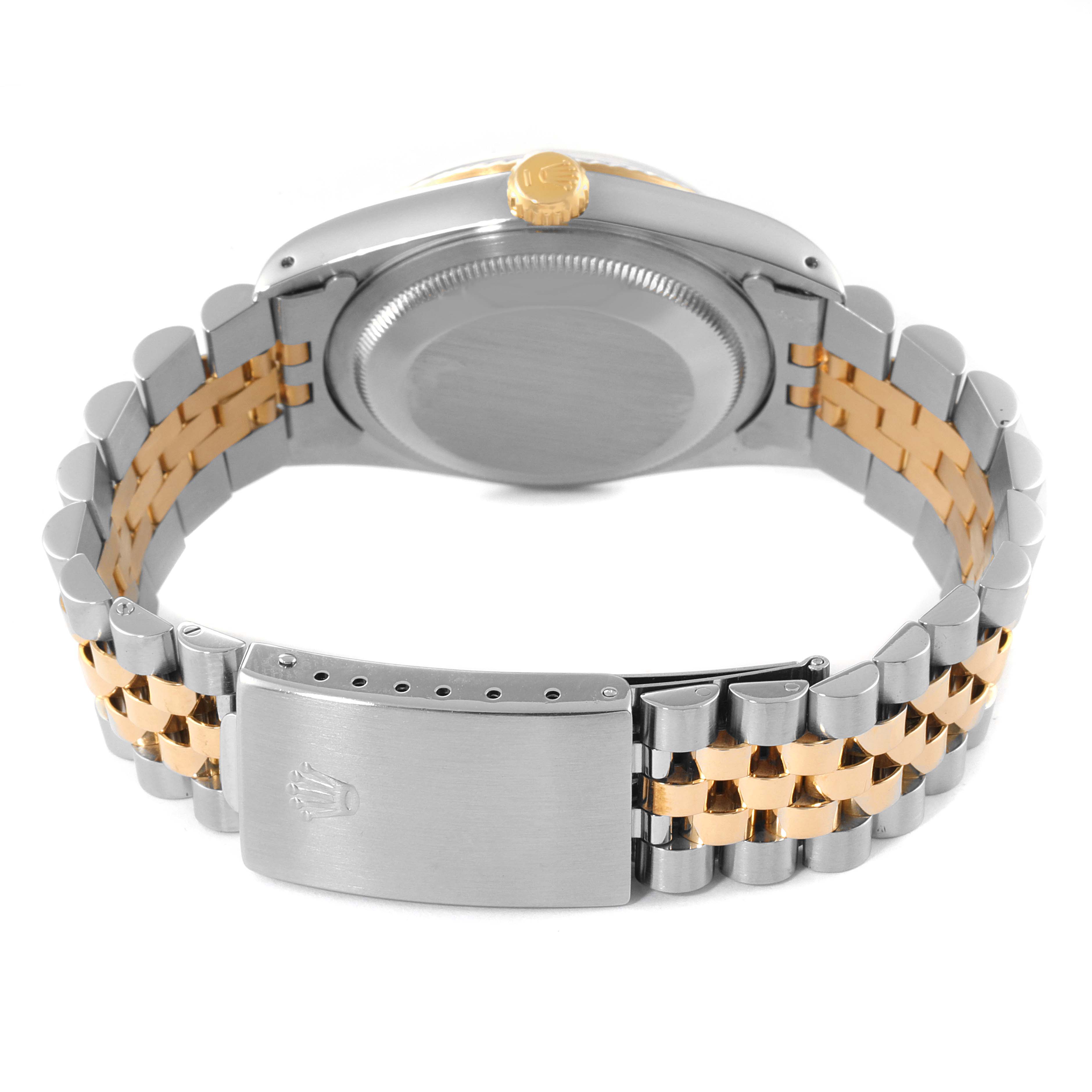 The image shows the back and bracelet of a Rolex Datejust 16233 Men's Steel and Gold (two tone) Champagne Dial 16233 Men's Steel and Gold (two tone) Champagne Dial watch, highlighting the clasp and crown.