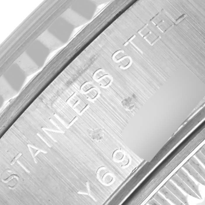 The image shows a close-up of the stainless steel engraving on the Rolex Datejust 79174NRD Women's Stainless Steel Mother of Pearl Dial 79174NRD Women's Stainless Steel Mother of Pearl Dial's inner watch case.