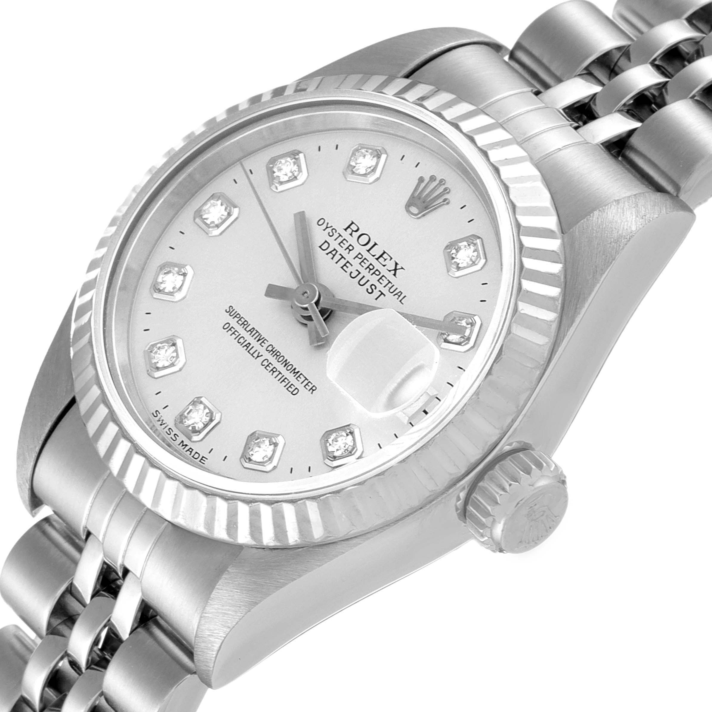 The image shows a close-up of the Rolex Datejust 69174 Women
s Stainless Steel Silver Dial 69174 Women
s Stainless Steel Silver Dial watch at an angle, highlighting the dial, bezel, bracelet, and winding crown.