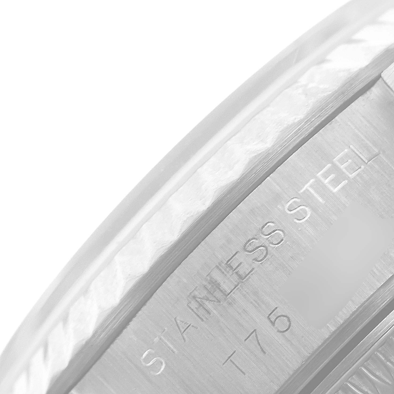 This close-up shows the stainless steel marking on the side of a Rolex Datejust 69174 Women
s Stainless Steel Silver Dial 69174 Women
s Stainless Steel Silver Dial watch case.