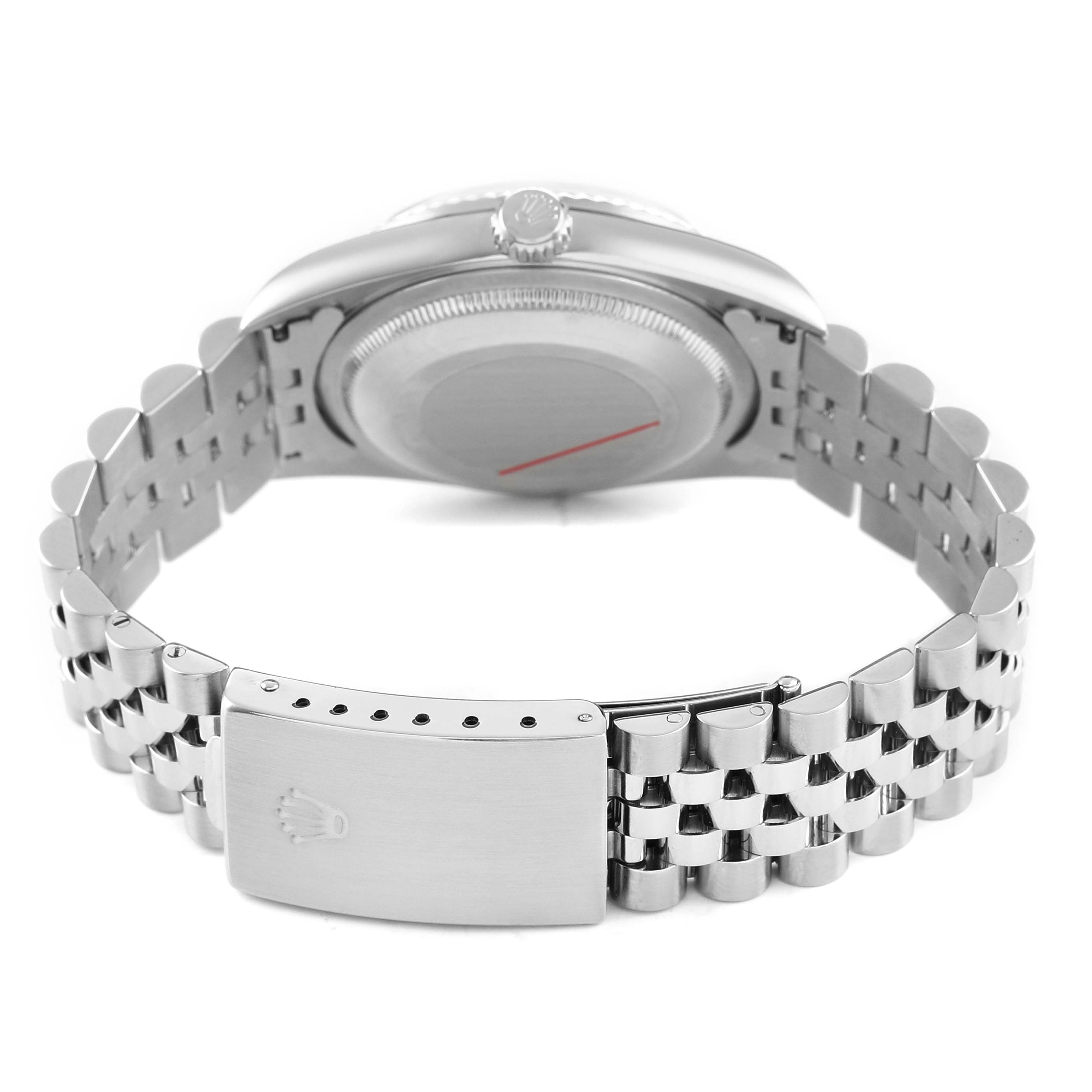 The image shows the back and bracelet of a Rolex Datejust 16234 Men's Stainless Steel Silver Dial, highlighting the clasp and engraved crown.