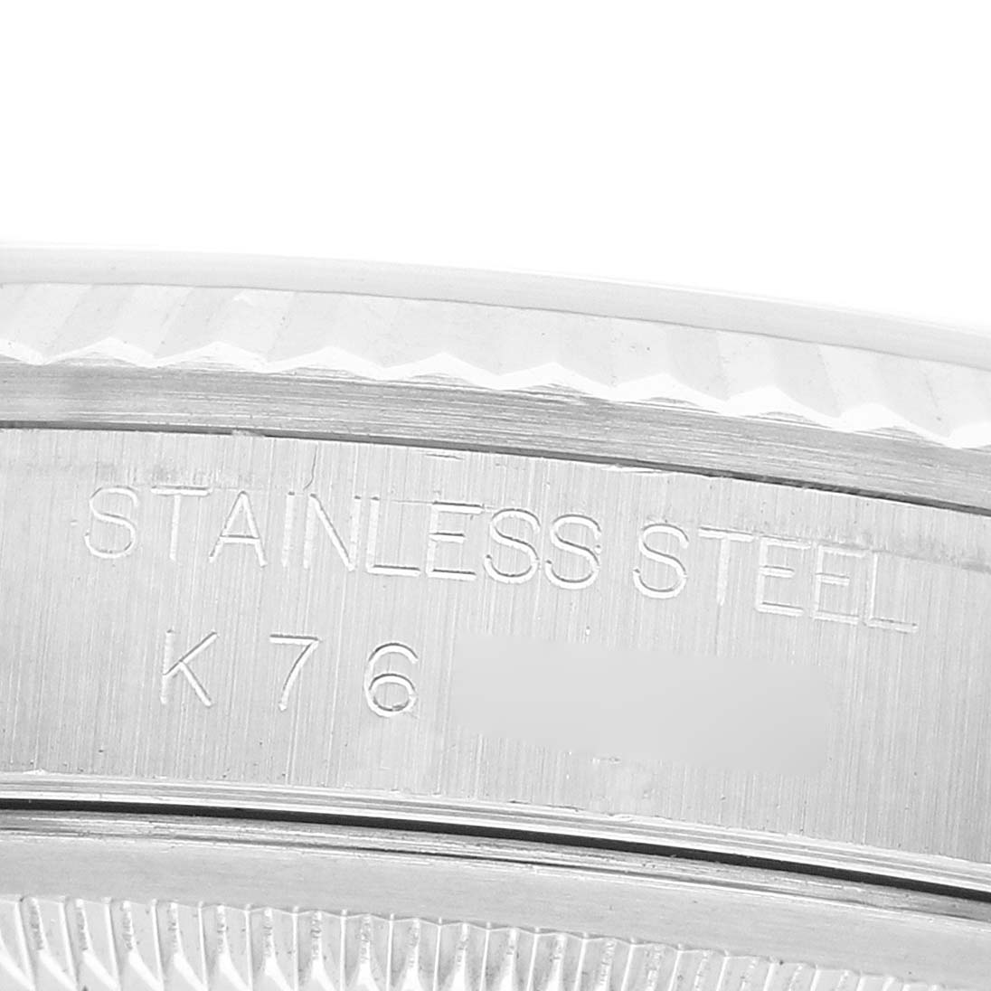 The image shows a close-up of the stainless steel case back of a Rolex Datejust 16234 Men's Stainless Steel Silver Dial watch.