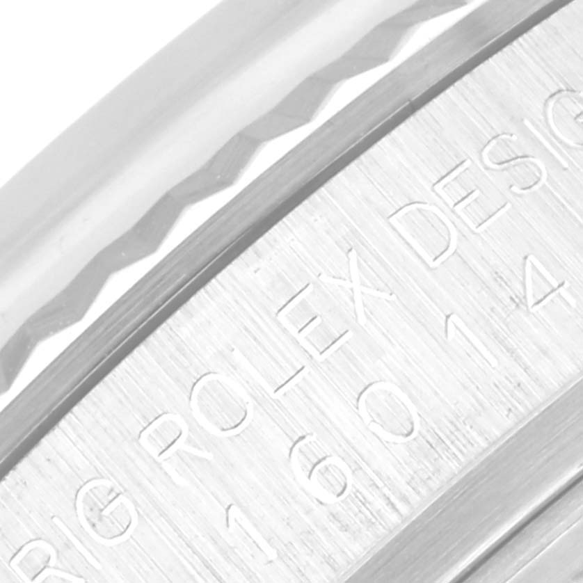 This close-up image shows the engraved details on the side of the case of a Vintage Collection model by Rolex.