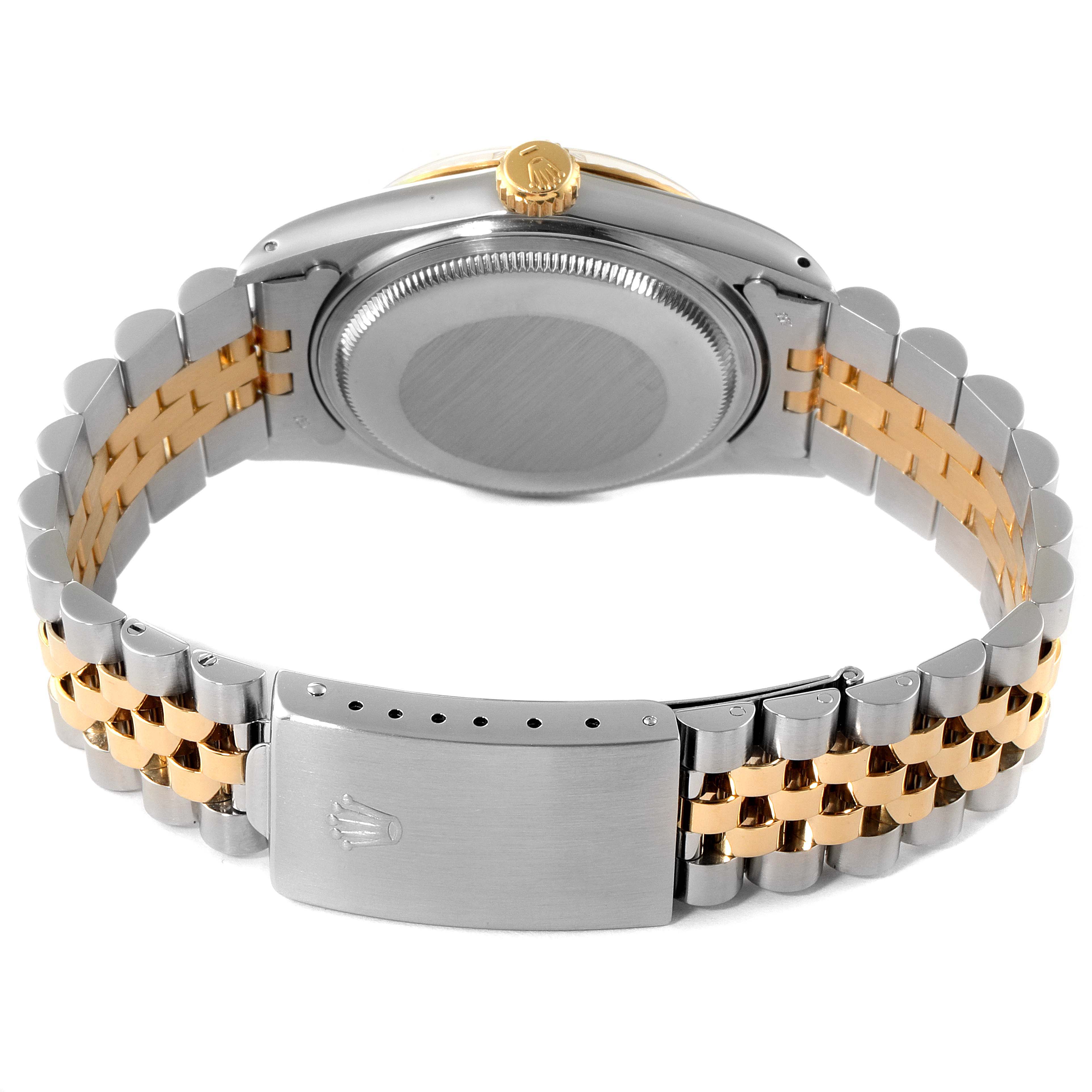 The image shows the back side and bracelet of the Rolex Vintage Collection 16013 Men's Steel and Gold (two tone) Champagne Dial 16013 Men's Steel and Gold (two tone) Champagne Dial watch, highlighting its two-tone links and clasp.