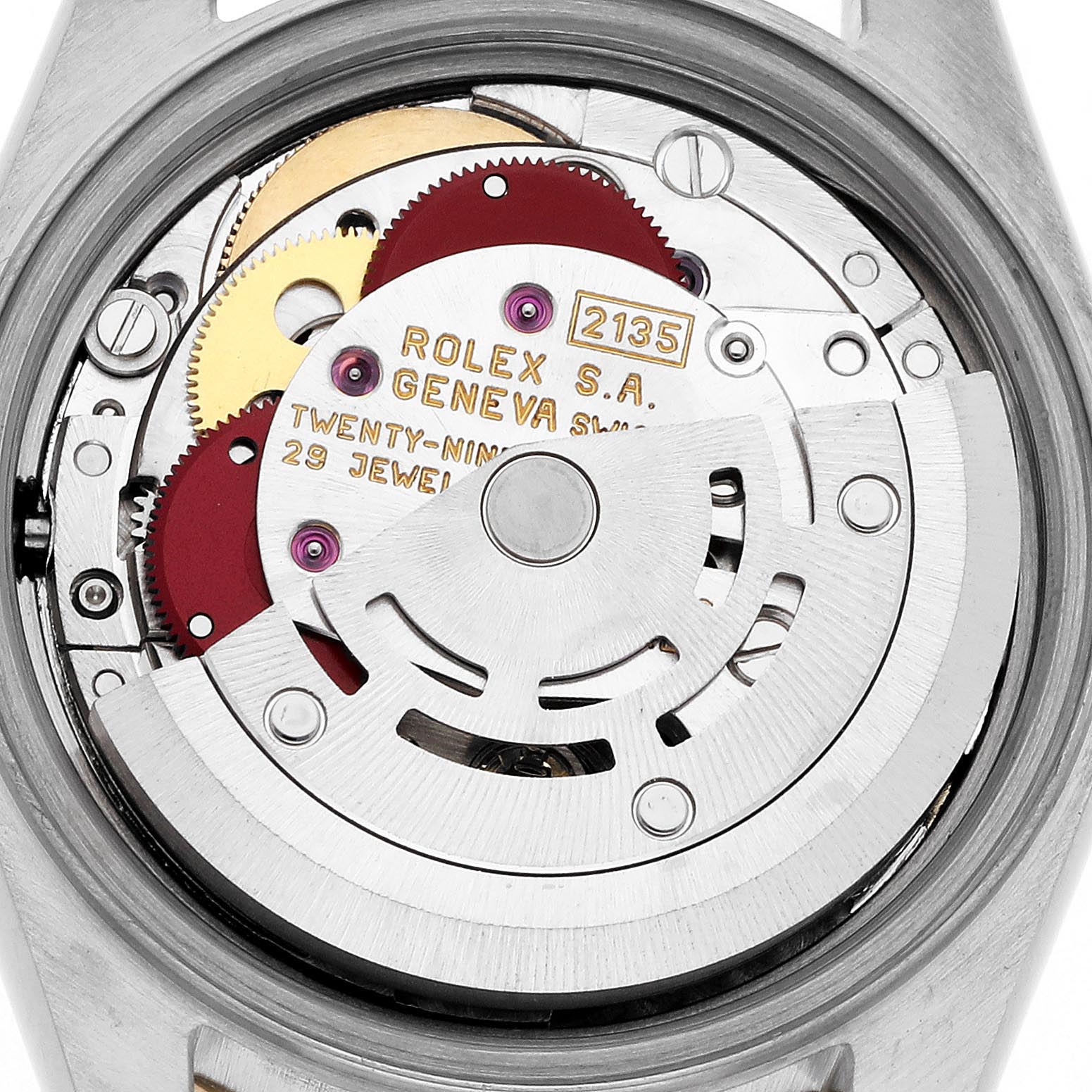 The image shows the Rolex Datejust 69173 Women's Steel and Gold (two tone) Champagne Dial 69173 Women's Steel and Gold (two tone) Champagne Dial's movement mechanism, viewed from the back, highlighting the rotor and internal gears.
