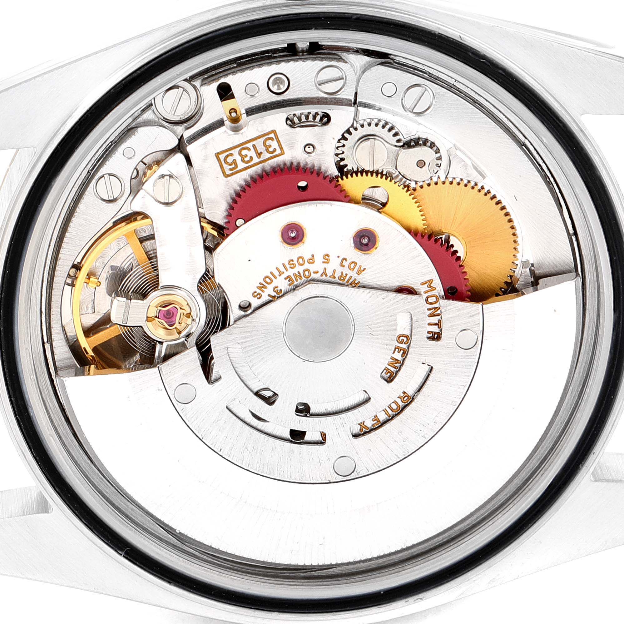 This image shows the intricate inner workings of a Rolex Datejust 16233 Men's Steel and Gold (two tone) Champagne Dial 16233 Men's Steel and Gold (two tone) Champagne Dial movement from a top-down angle.