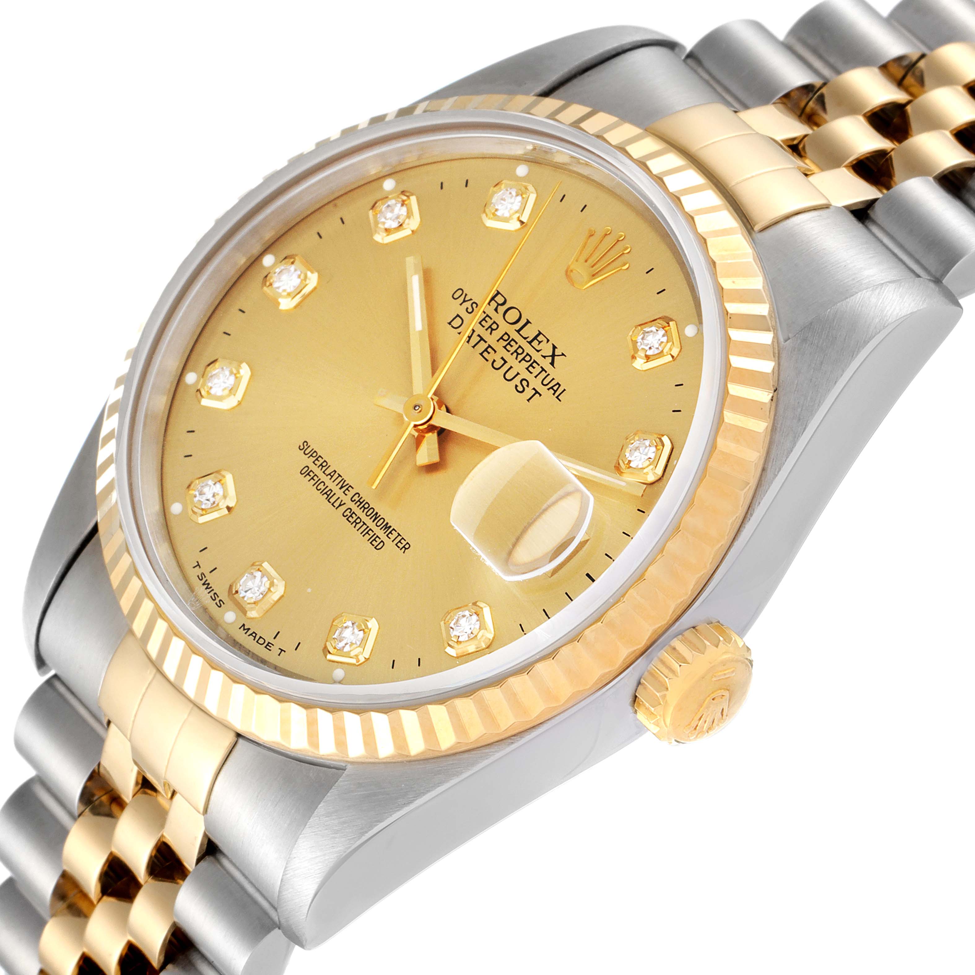 This image shows a Rolex Datejust 16233 Men's Steel and Gold (two tone) Champagne Dial 16233 Men's Steel and Gold (two tone) Champagne Dial watch from an angled top view, highlighting the gold dial, bezel, and two-tone bracelet.