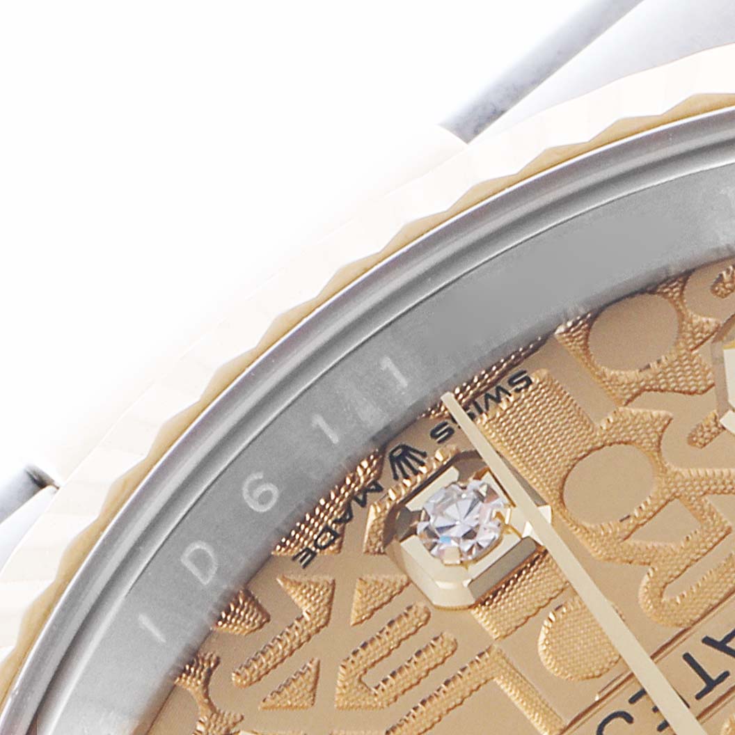 The image shows a close-up of the Rolex Datejust 126233 Men's Steel and Gold (two tone) Champagne Dial 126233 Men's Steel and Gold (two tone) Champagne Dial dial, focusing on the textured surface, diamond marker, and partial bezel.