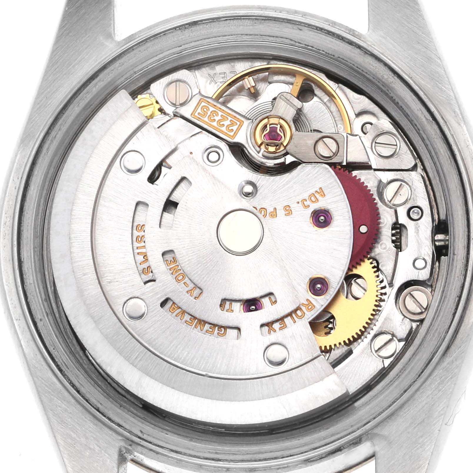 The image shows the movement of a Rolex Datejust 79173 Women's Steel and Gold (two tone) Champagne Dial 79173 Women's Steel and Gold (two tone) Champagne Dial watch from a rear view, highlighting gears and the rotor.