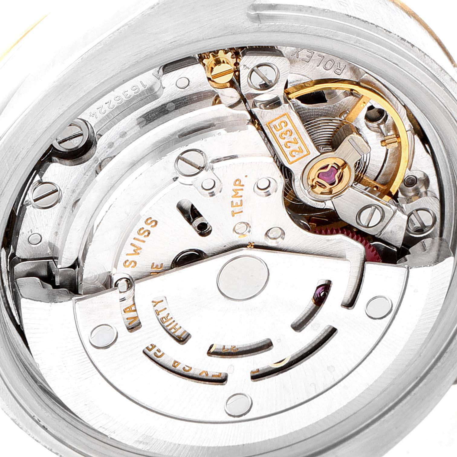 This image shows the inner mechanical movement of a Rolex Datejust 179173 Women's Steel and Gold (two tone) White Dial 179173 Women's Steel and Gold (two tone) White Dial watch viewed from the back.
