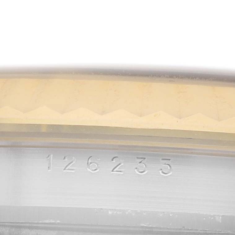 The image shows a close-up of the Rolex Datejust 126233 Men's Steel and Gold (two tone) White Dial 126233 Men's Steel and Gold (two tone) White Dial's model number engraved on the case side below a fluted bezel.