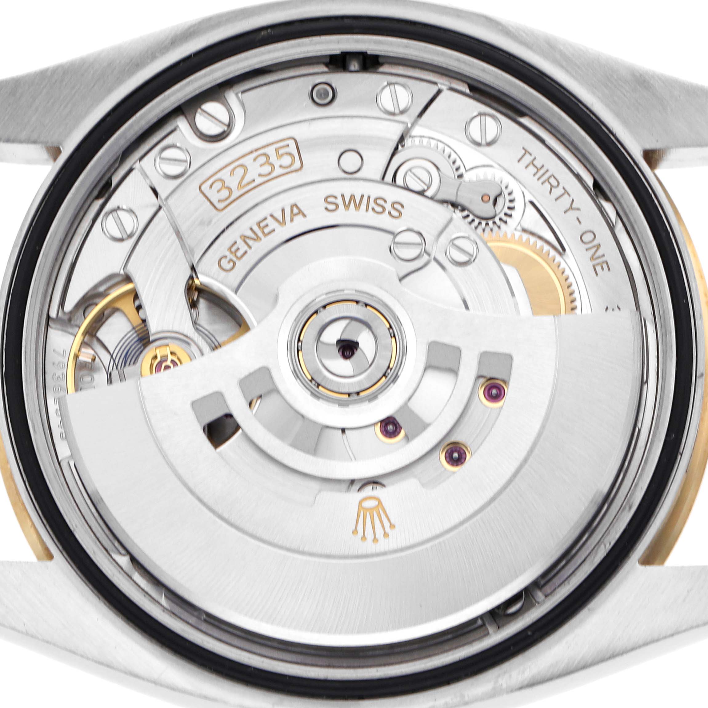 The image shows the movement of a Rolex Datejust 126233 Men's Steel and Gold (two tone) White Dial 126233 Men's Steel and Gold (two tone) White Dial watch, focusing on its intricate internal mechanisms.