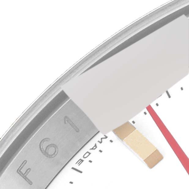 This is a close-up of the bezel, dial, and hands of the Rolex Turn-o-Graph 116263 Men's Steel and Gold (two tone) White Dial 116263 Men's Steel and Gold (two tone) White Dial watch, showing time markings and part of the casing.