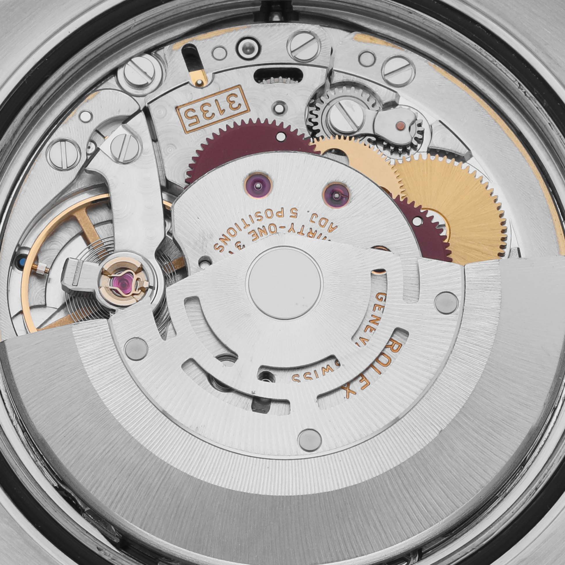 The image shows the movement of a Rolex Turn-o-Graph 116264 Men
s Stainless Steel Blue Dial 116264 Men
s Stainless Steel Blue Dial watch from a top-down angle, revealing gears and components.