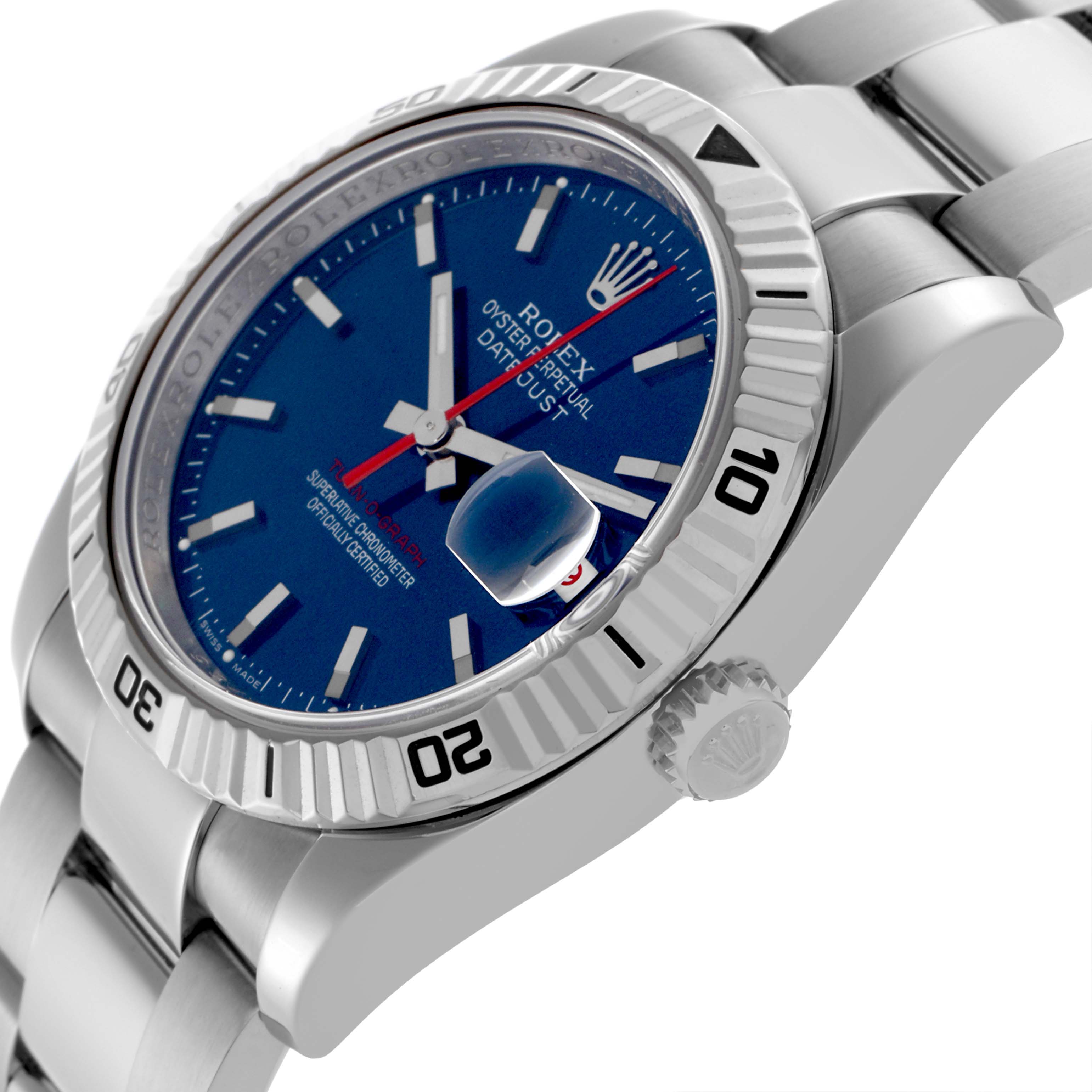 The image shows a Rolex Turn-o-Graph 116264 Men
s Stainless Steel Blue Dial 116264 Men
s Stainless Steel Blue Dial watch at an angle highlighting the blue dial, rotating bezel, crown, and part of the bracelet.