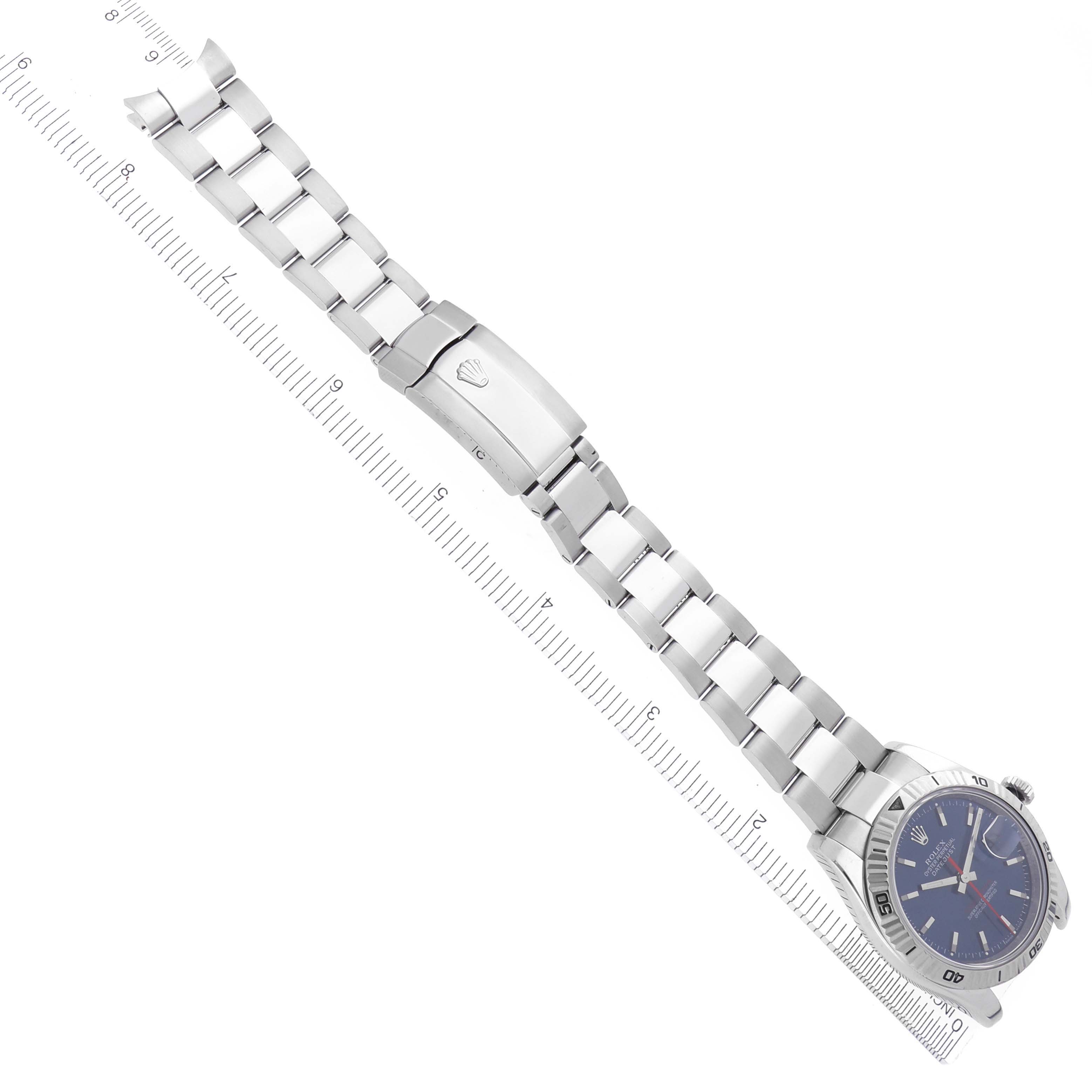 The image shows a Rolex Turn-o-Graph 116264 Men
s Stainless Steel Blue Dial 116264 Men
s Stainless Steel Blue Dial watch lying flat, highlighting the face, bezel, and full bracelet with clasp detailing.