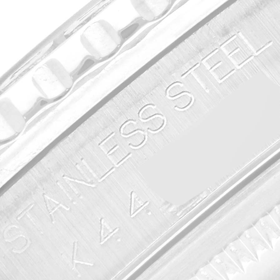 This close-up image shows the engraved stainless steel bezel and part of the case of the Turn-o-Graph model by Rolex.