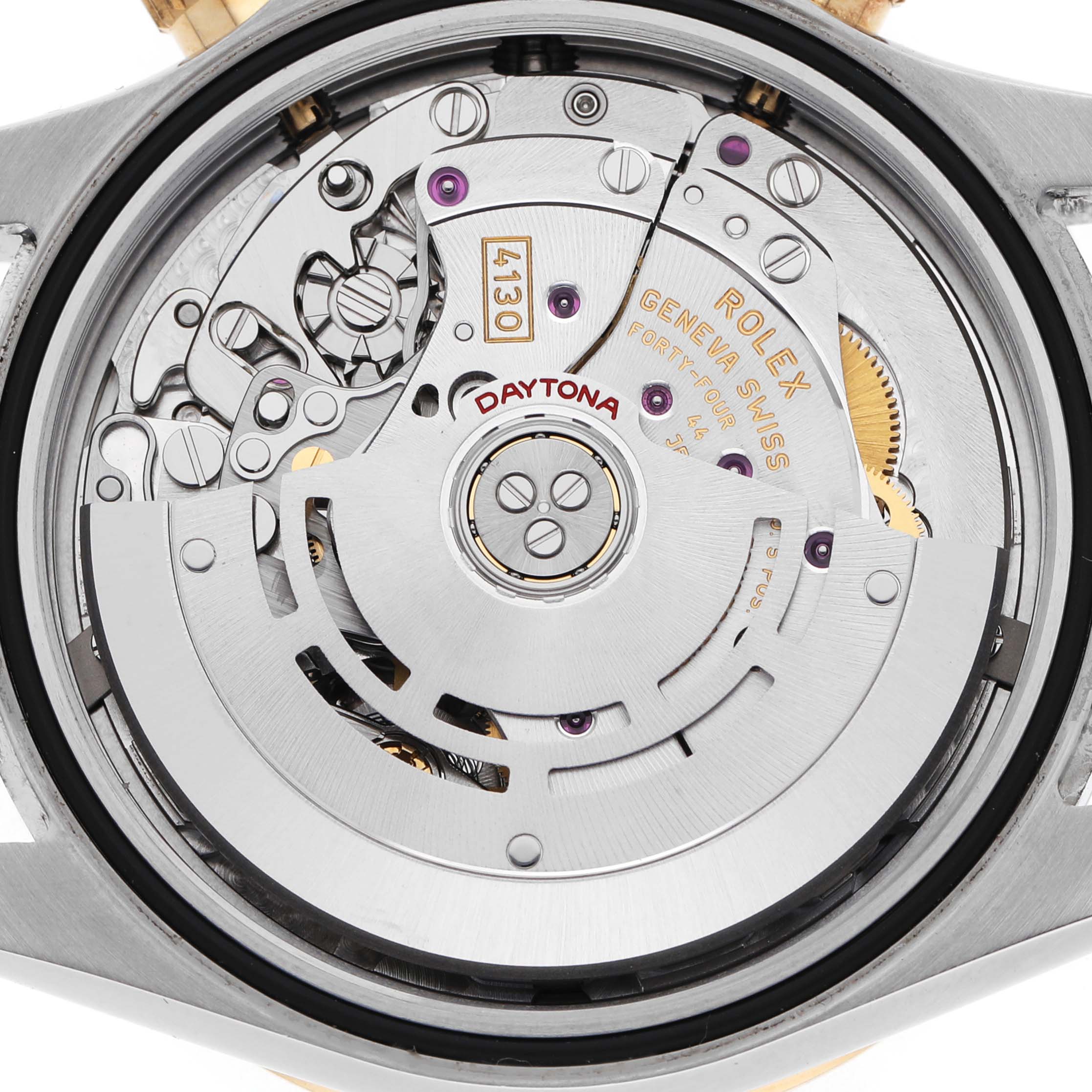 The image shows the movement of the Rolex Daytona 116523 Men's Steel and Gold (two tone) Silver Dial watch at a close-up angle.