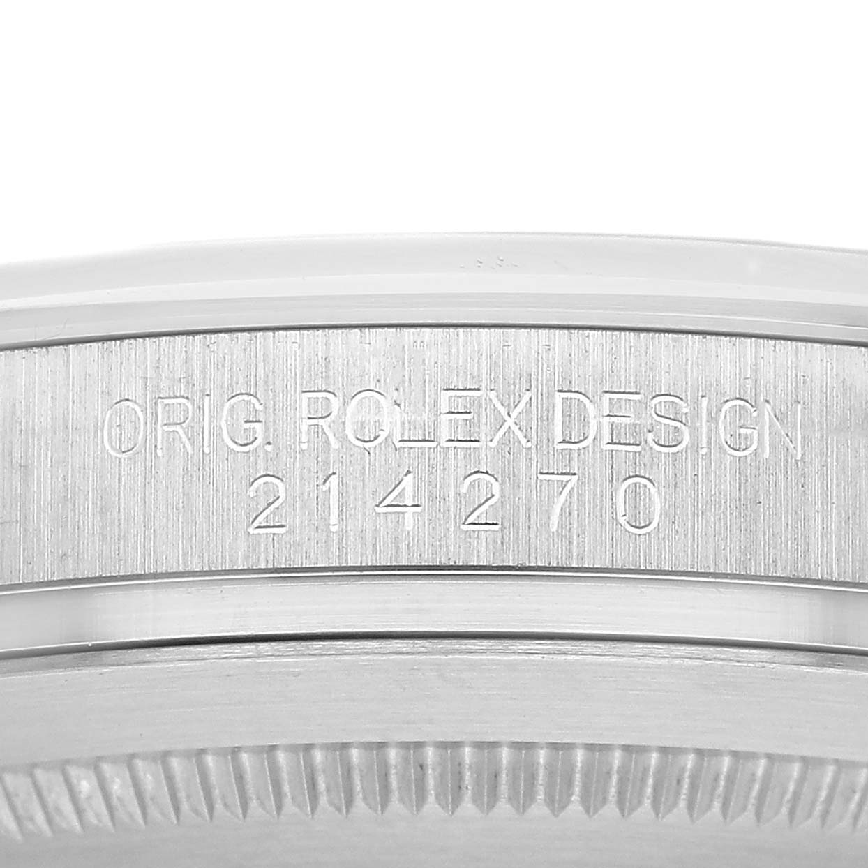 The image shows a close-up of the side of the Rolex Explorer 214270 Men's Stainless Steel Black Dial model 214270 with engraved text.