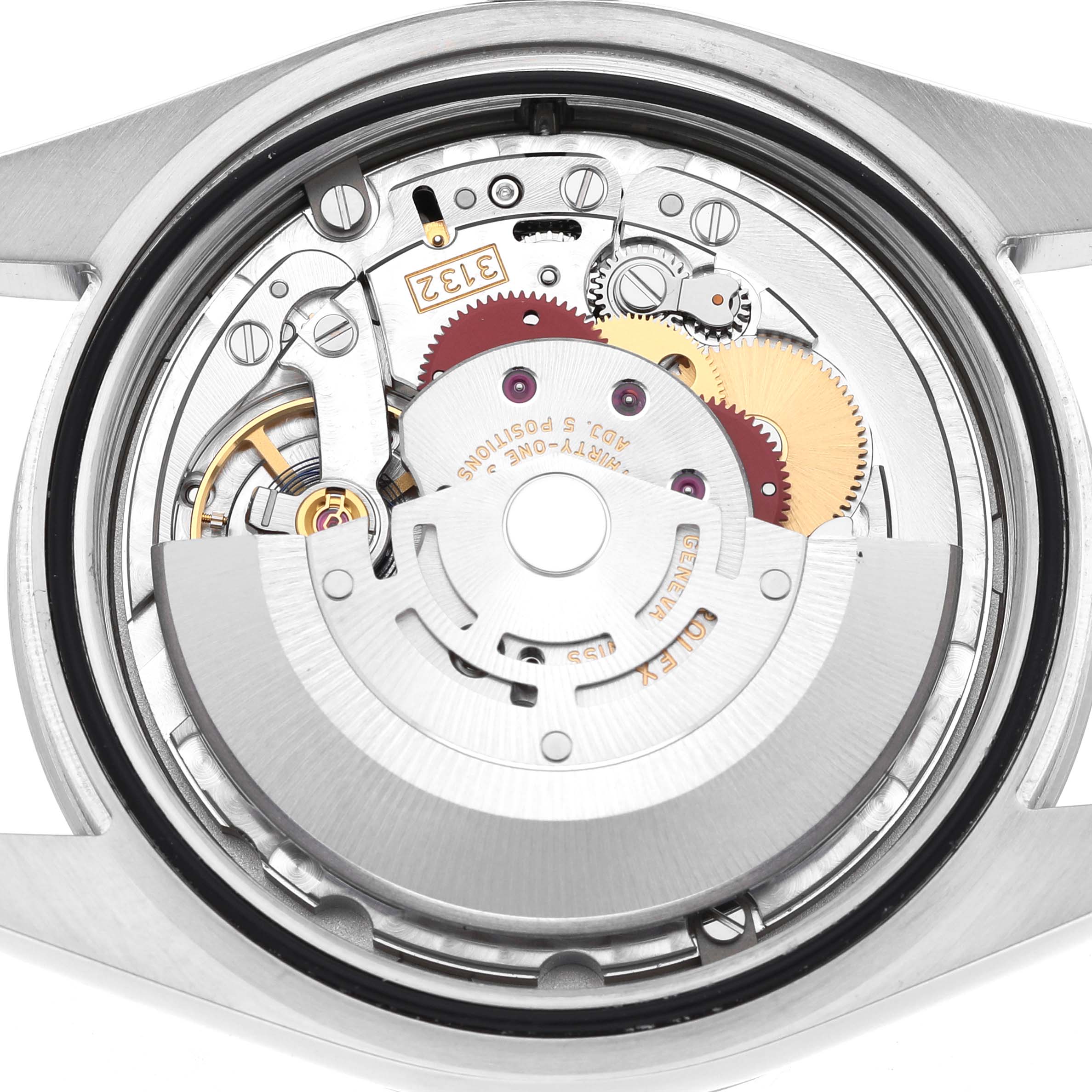The image shows the movement mechanism of a Rolex Explorer 214270 Men's Stainless Steel Black Dial watch from the back, highlighting gears and components.