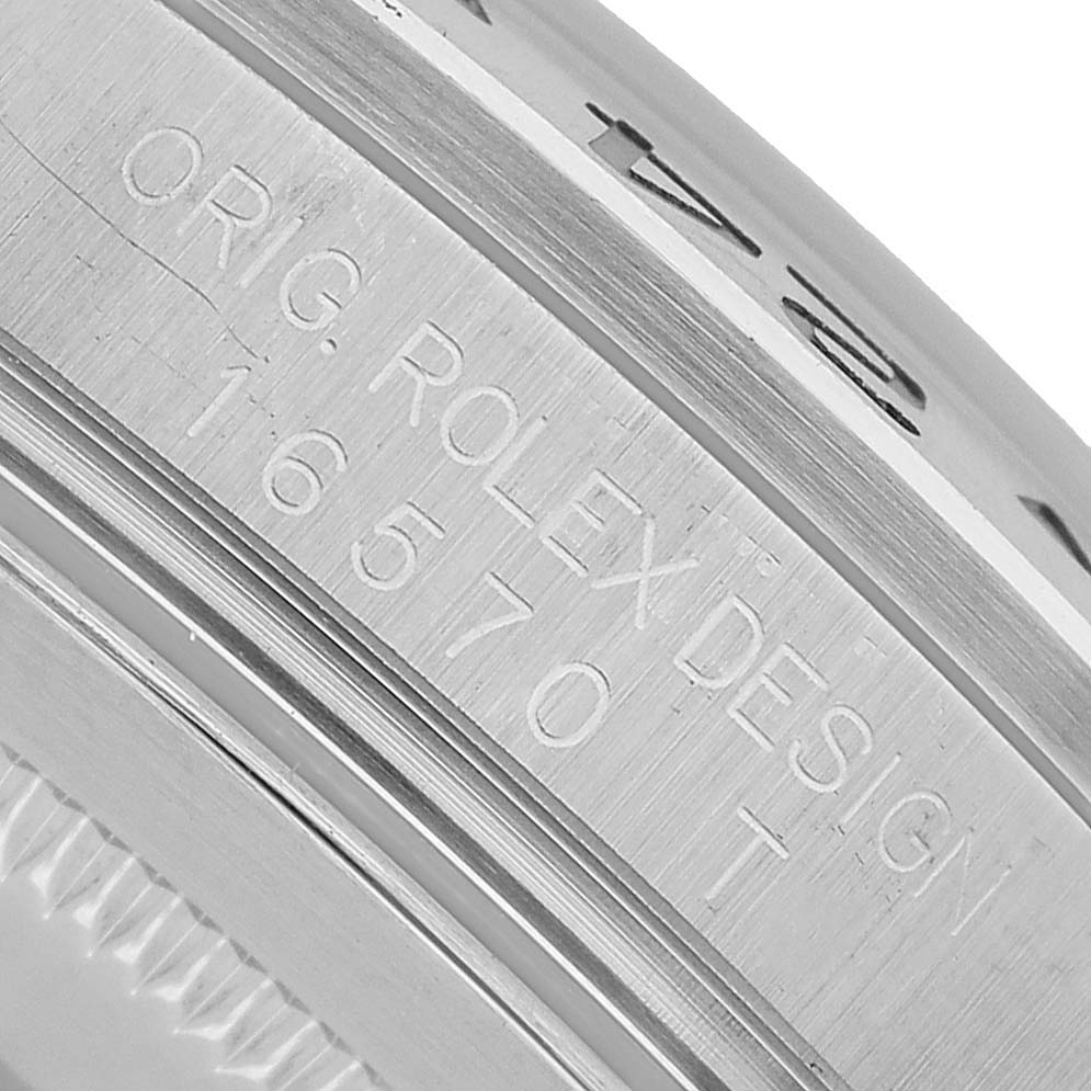 This image shows a close-up of the side engraving on a Rolex Explorer 16570 Men's Stainless Steel Black Dial watch, highlighting the model number.