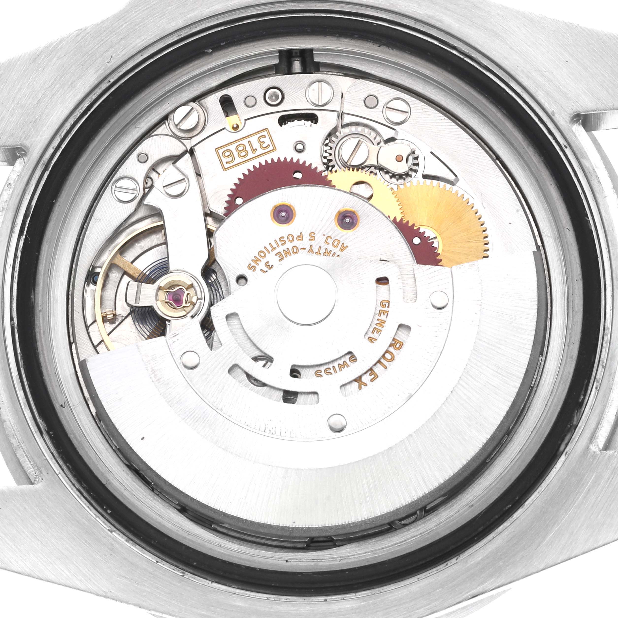 The image shows the movement mechanism of the Rolex GMT-Master 116710 Men
s Stainless Steel Black Dial 116710 Men
s Stainless Steel Black Dial watch from a back angle with the case back removed.