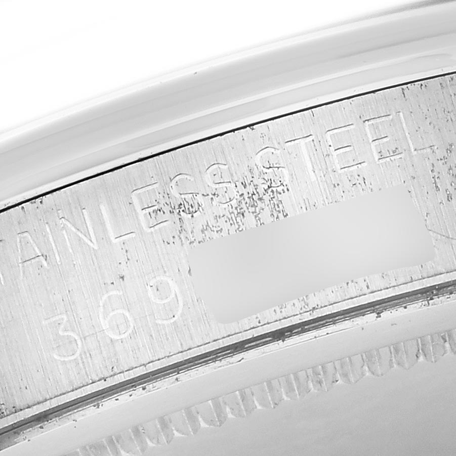 The image shows a close-up of the Rolex Vintage Collection 6426 Men's Stainless Steel Silver Dial 6426 Men's Stainless Steel Silver Dial model's stainless steel case back edge.