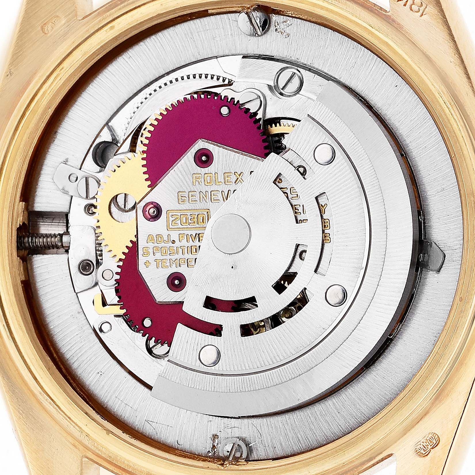 This image shows the movement from the back of a Rolex President 6827 Women's Yellow Gold Silver Dial model, highlighting its intricate mechanics.