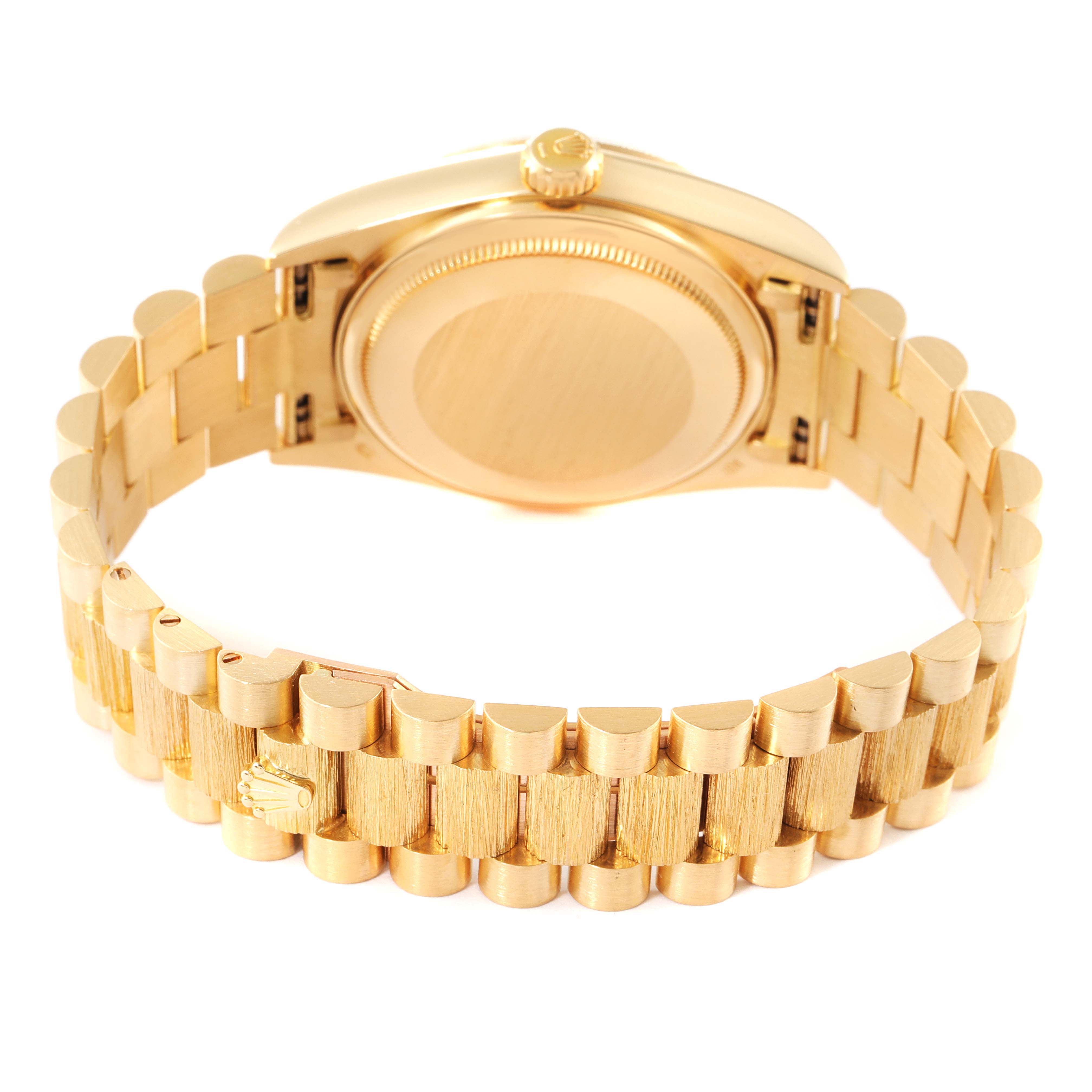 The image shows the back view of a Rolex President 18078 Men's Yellow Gold Black Dial 18078 Men's Yellow Gold Black Dial model watch, highlighting its case back and bracelet.