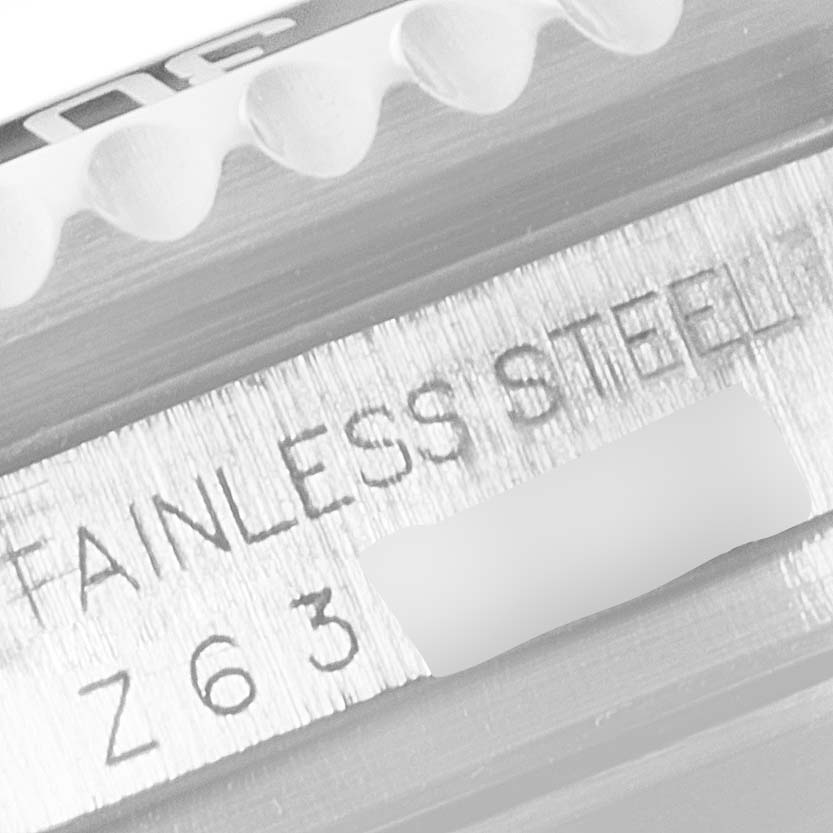 The image shows a close-up of the bezel edge and stainless steel marking on a Rolex Sea-Dweller 16600 Men
s Stainless Steel Black Dial 16600 Men
s Stainless Steel Black Dial watch.