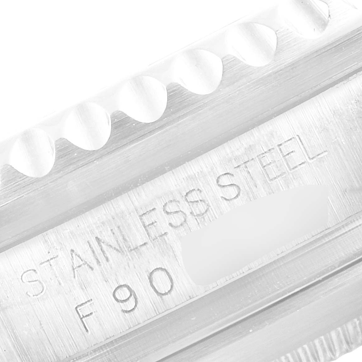 This image shows a close-up of the stainless steel case and serrated bezel edge of the Rolex Sea-Dweller 16600 Men
s Stainless Steel Black Dial 16600 Men
s Stainless Steel Black Dial watch.