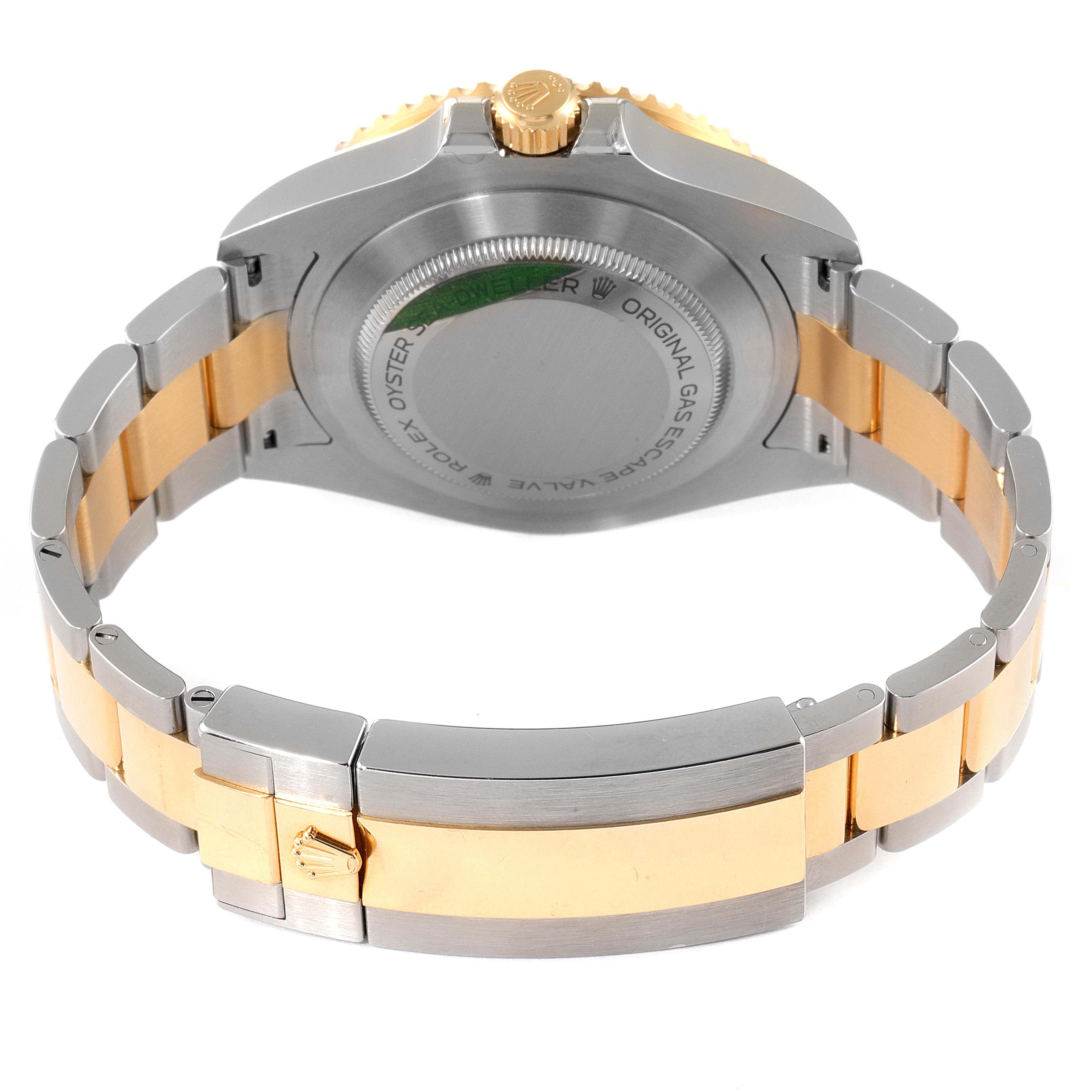 The image shows the back view of the Rolex Sea-Dweller 126603 Men's Steel and Gold (two tone) Black Dial 126603 Men's Steel and Gold (two tone) Black Dial watch, highlighting the case back and two-tone bracelet.