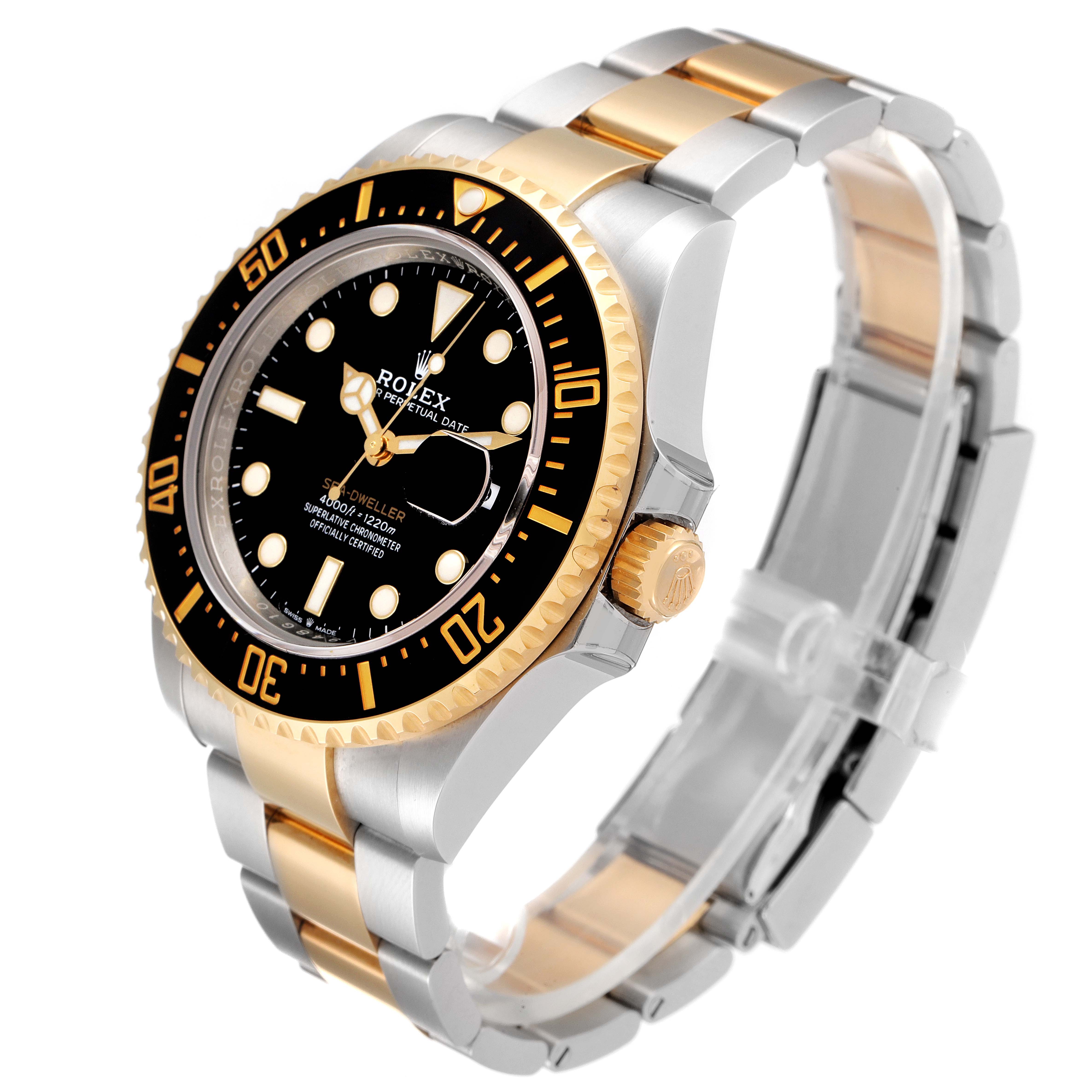 The image shows a Rolex Sea-Dweller 126603 Men's Steel and Gold (two tone) Black Dial 126603 Men's Steel and Gold (two tone) Black Dial watch at an oblique angle, highlighting its black dial, gold bezel, and two-tone metal bracelet.