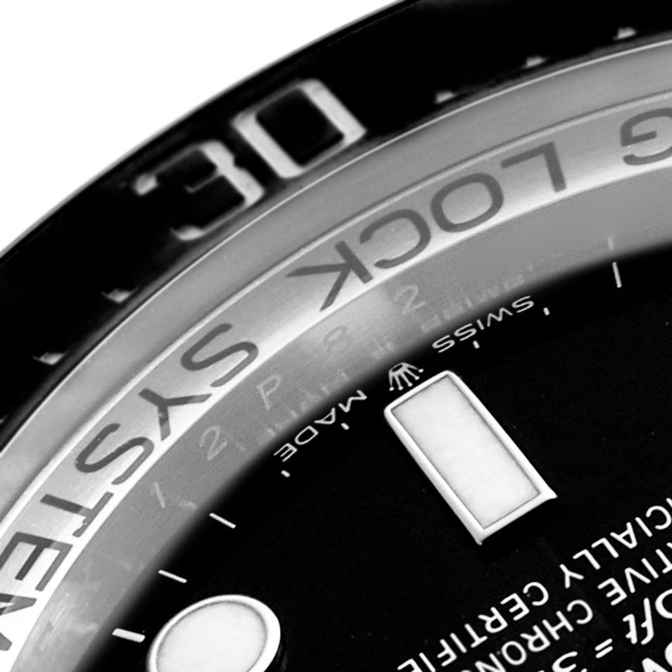 The image shows a close-up of the dial and bezel of the Rolex Sea-Dweller 126660 Men's Stainless Steel Black Dial 126660 Men's Stainless Steel Black Dial watch, highlighting the ring lock system and markers.