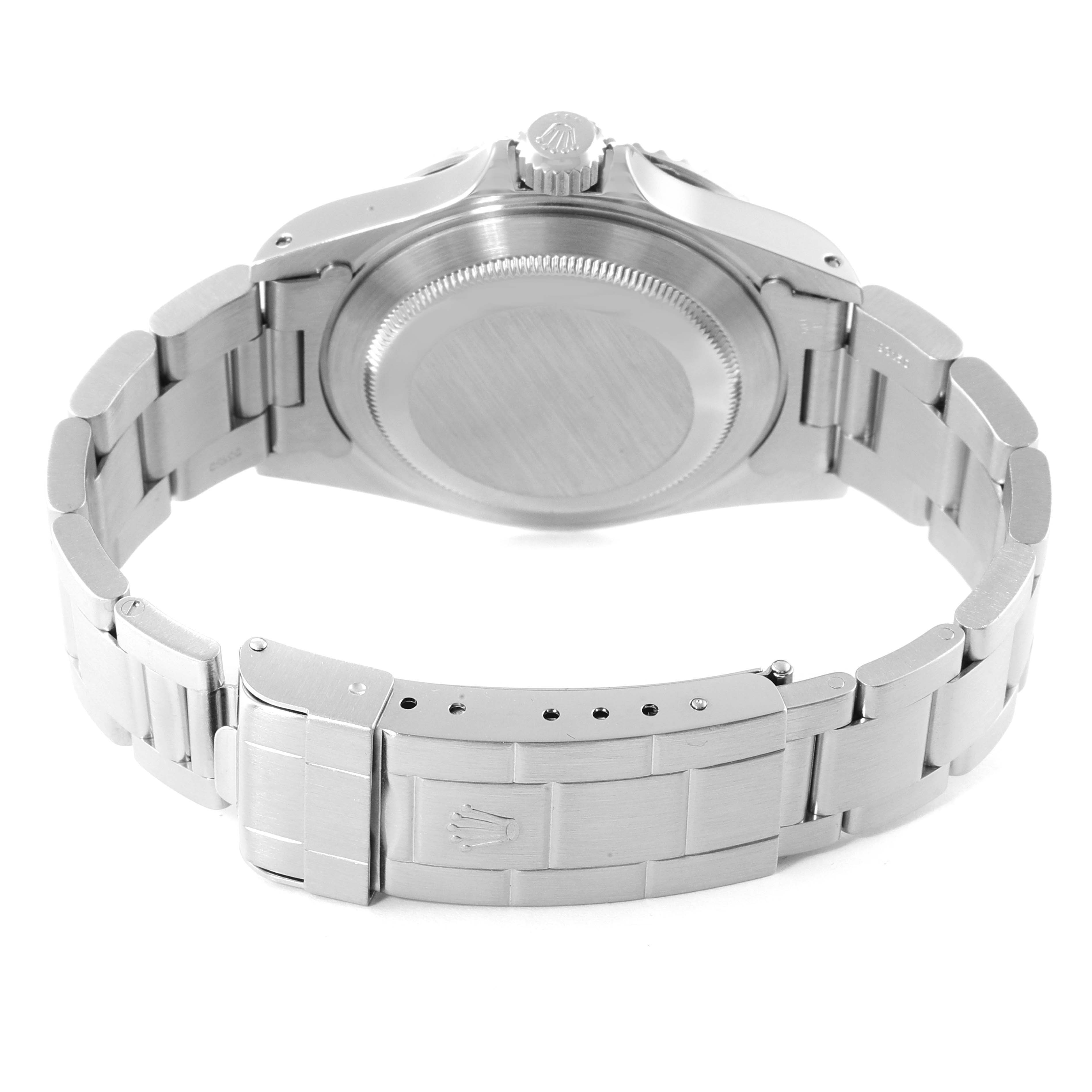 This image shows the back view of the Rolex Submariner 14060M Men
s Stainless Steel Black Dial 14060M Men
s Stainless Steel Black Dial watch, highlighting the case back and the bracelet clasp.