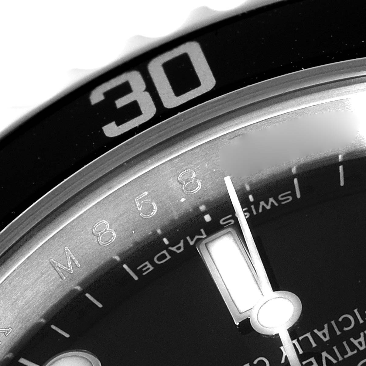 This close-up image shows the bezel and part of the dial of a Rolex Submariner 14060M Men
s Stainless Steel Black Dial 14060M Men
s Stainless Steel Black Dial watch, highlighting the "30" mark and "SWISS MADE" text.