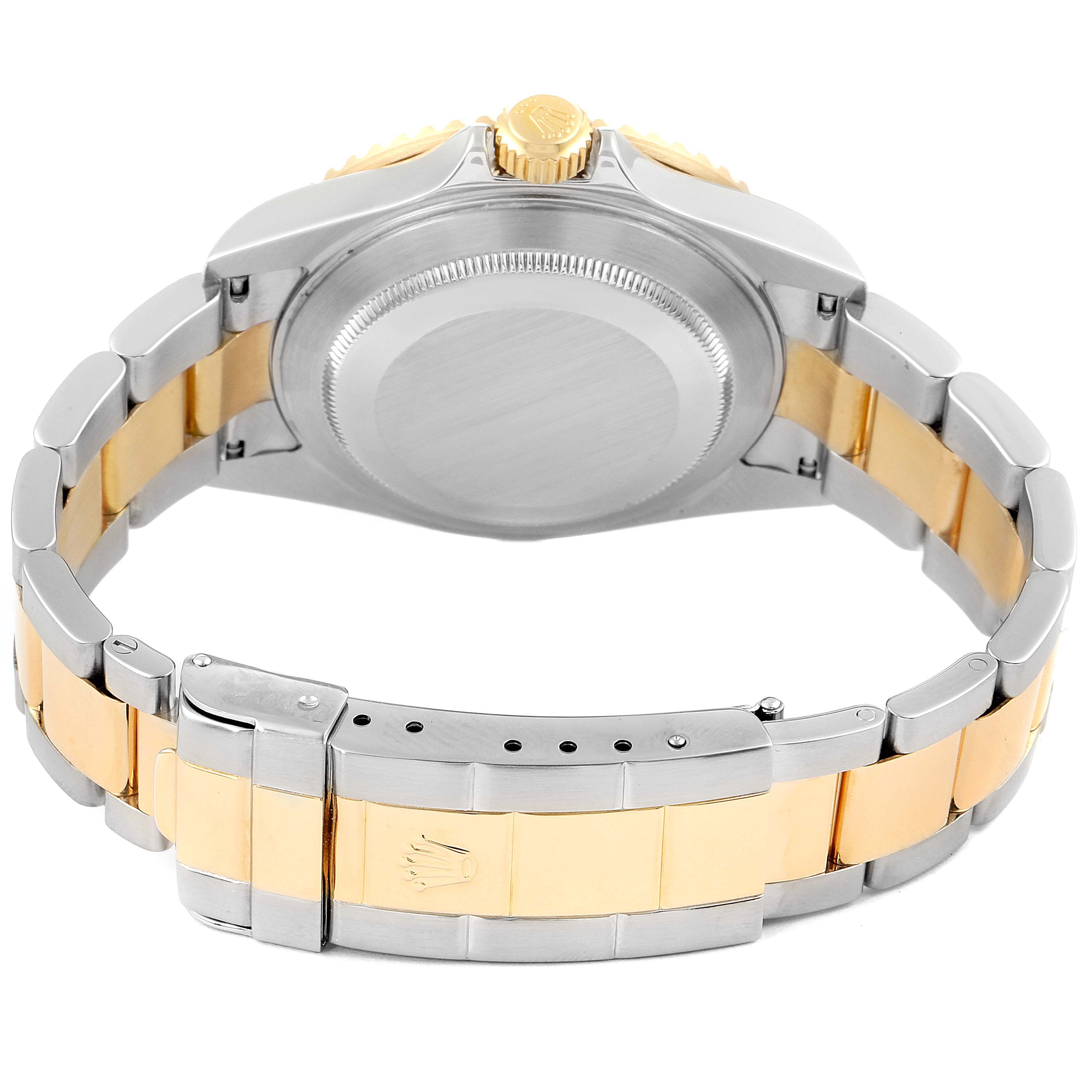 This image shows the back case and bracelet of a Rolex Submariner 16613 Men's Steel and Gold (two tone) Blue Dial 16613 Men's Steel and Gold (two tone) Blue Dial watch, highlighting the two-tone metal design.