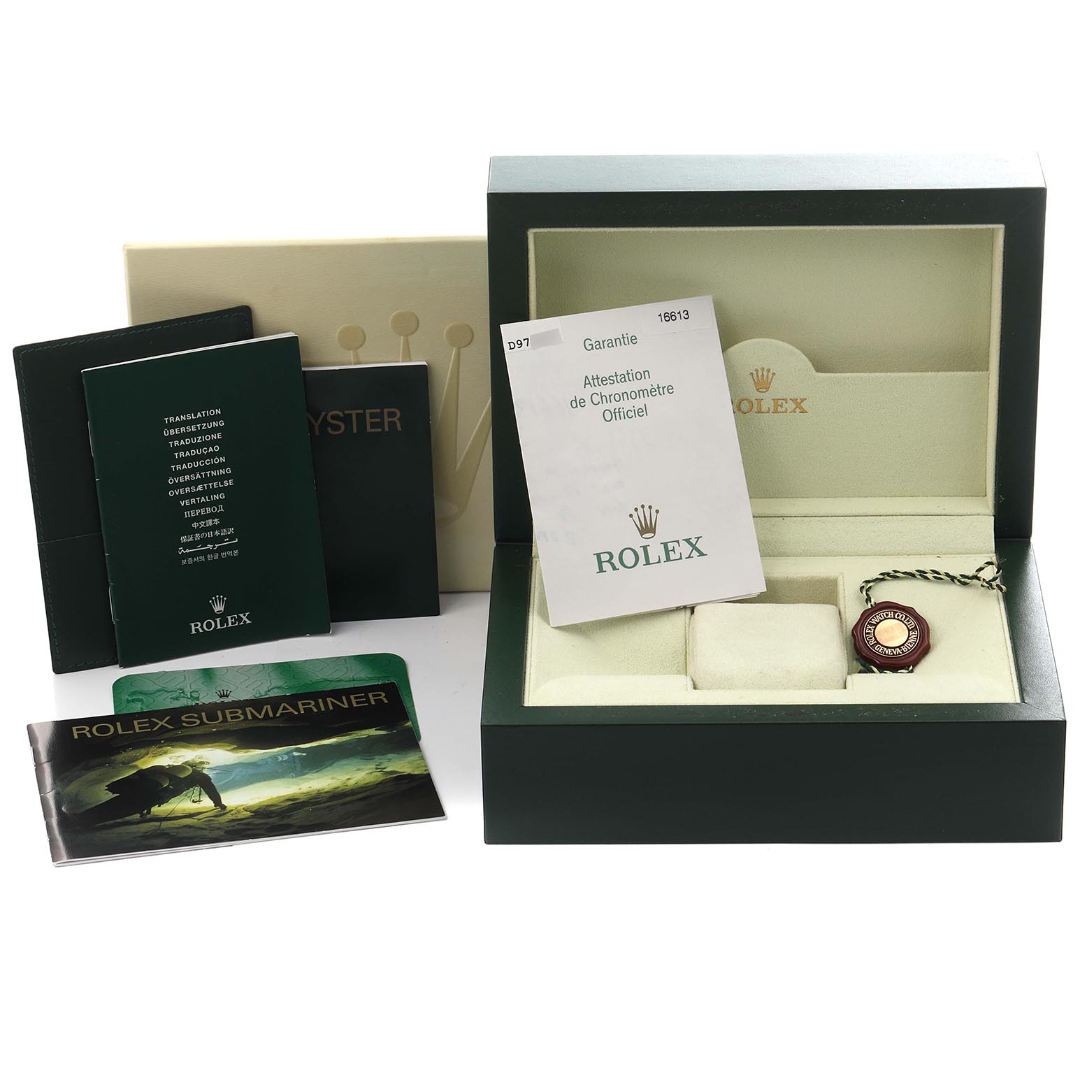 The image shows accessories for a Rolex Submariner 16613 Men's Steel and Gold (two tone) Blue Dial 16613 Men's Steel and Gold (two tone) Blue Dial, including a box, manuals, and warranty card.