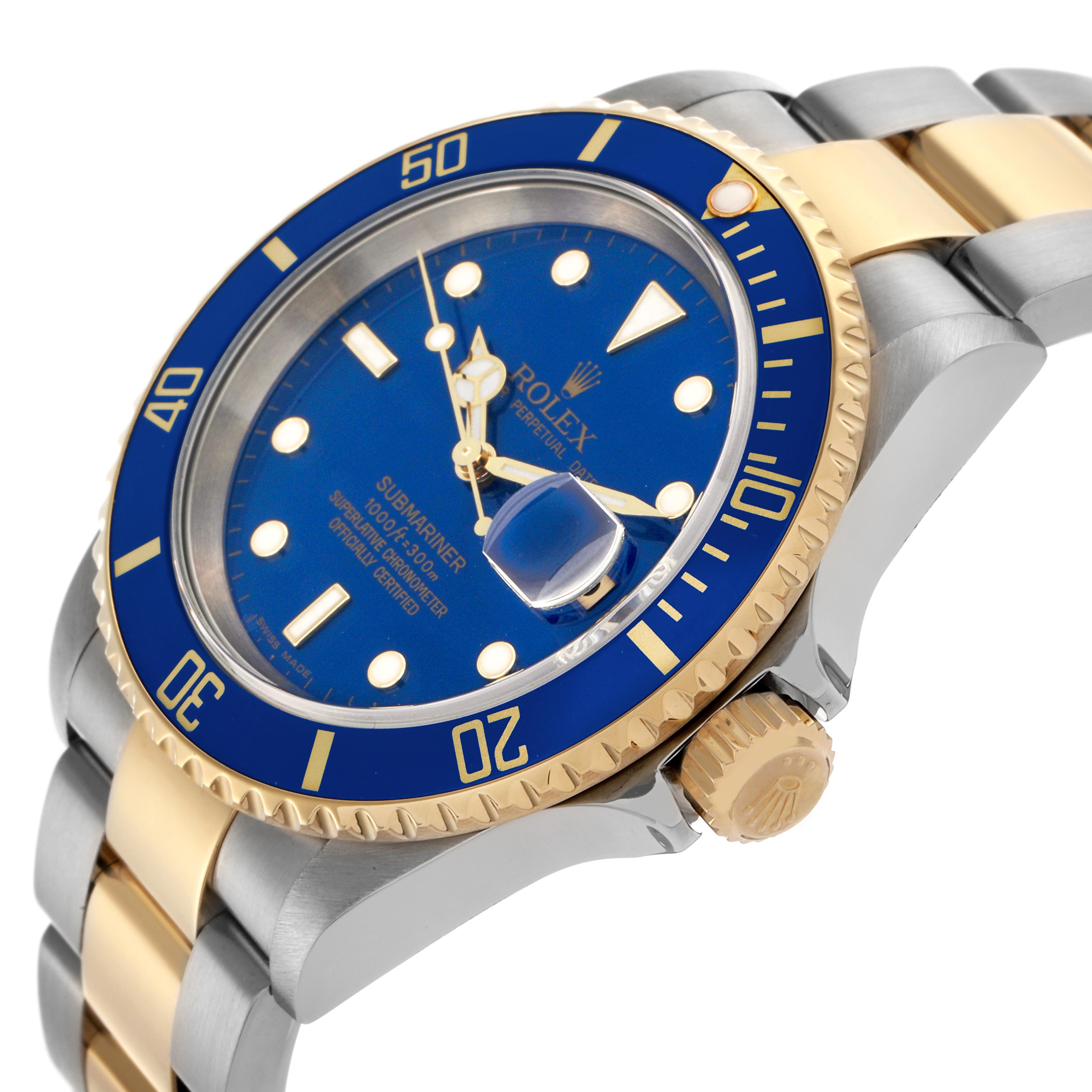 The Rolex Submariner 16613 Men's Steel and Gold (two tone) Blue Dial 16613 Men's Steel and Gold (two tone) Blue Dial watch is shown at an angled side view, highlighting the blue bezel, dial, crown, and two-tone bracelet.