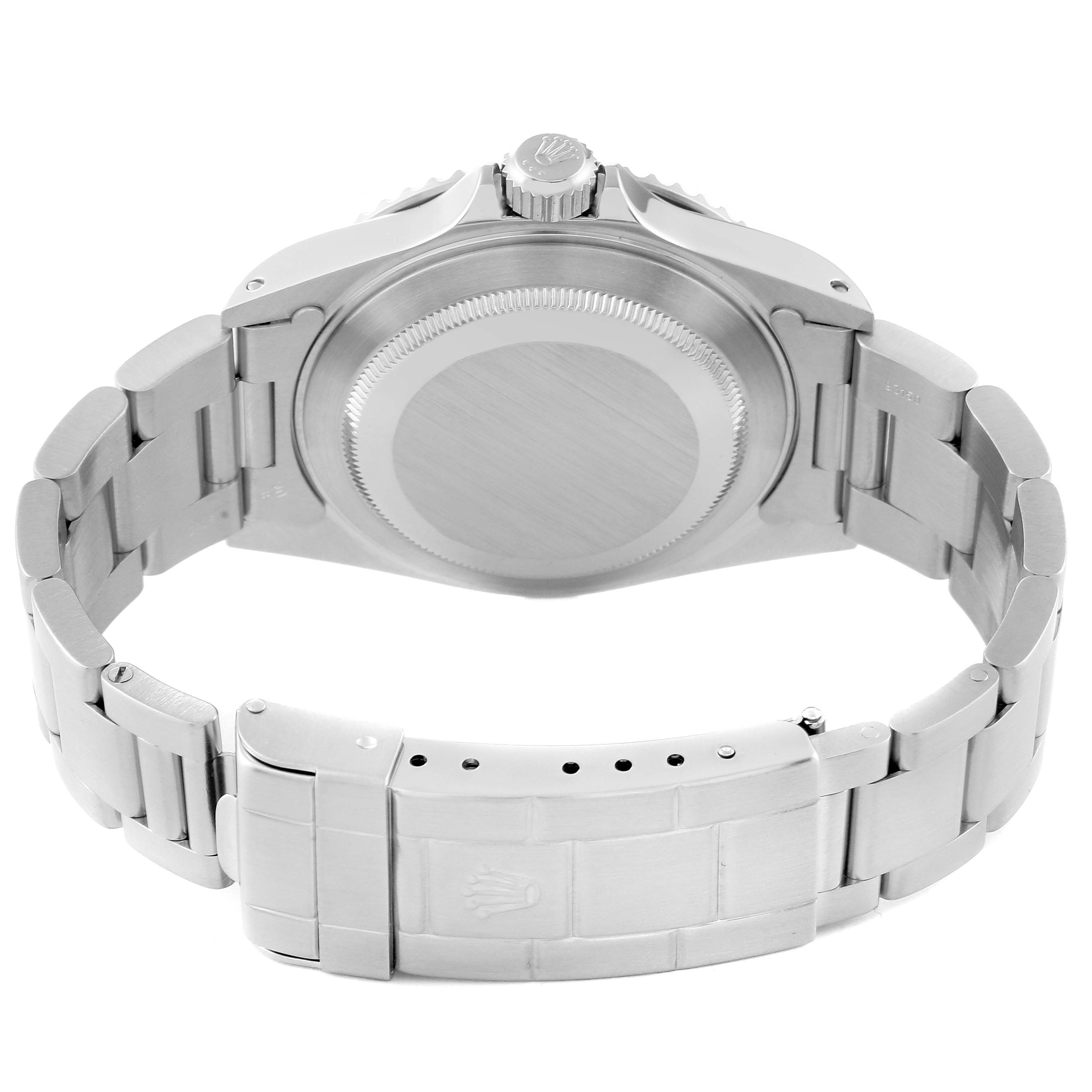 The image shows the back side of a Rolex Submariner 14060 Men
s Stainless Steel Black Dial 14060 Men
s Stainless Steel Black Dial watch, including its case and bracelet closed clasp.