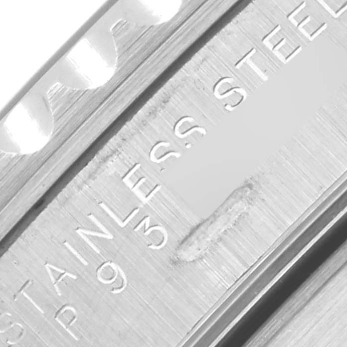 The image shows a close-up of the inner engraving on a Rolex Submariner 14060M Men's Stainless Steel Black Dial 14060M Men's Stainless Steel Black Dial's stainless steel case.