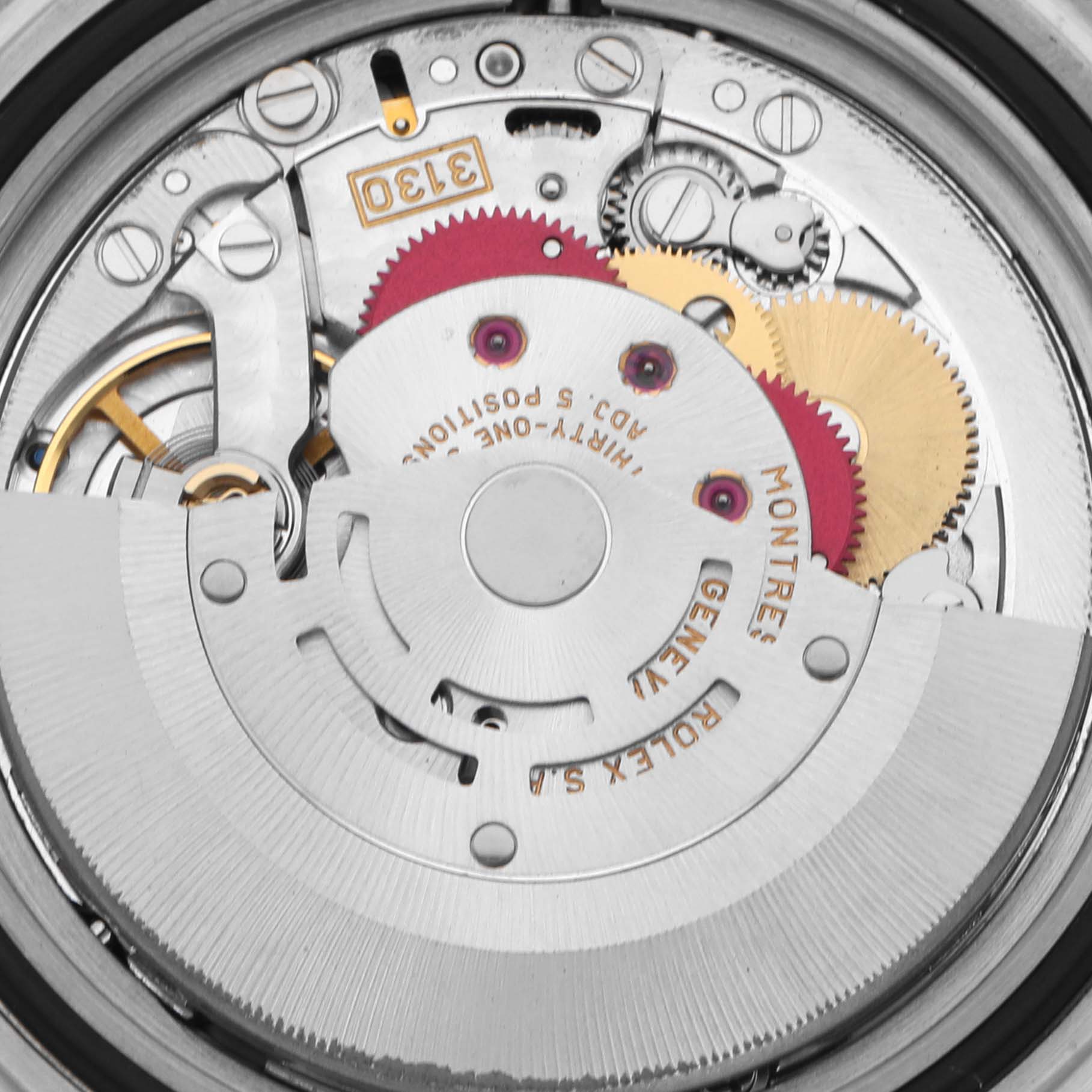 The image shows the detailed movement of a Rolex Submariner 14060M Men's Stainless Steel Black Dial 14060M Men's Stainless Steel Black Dial, viewed from the back, highlighting gears and mechanisms.